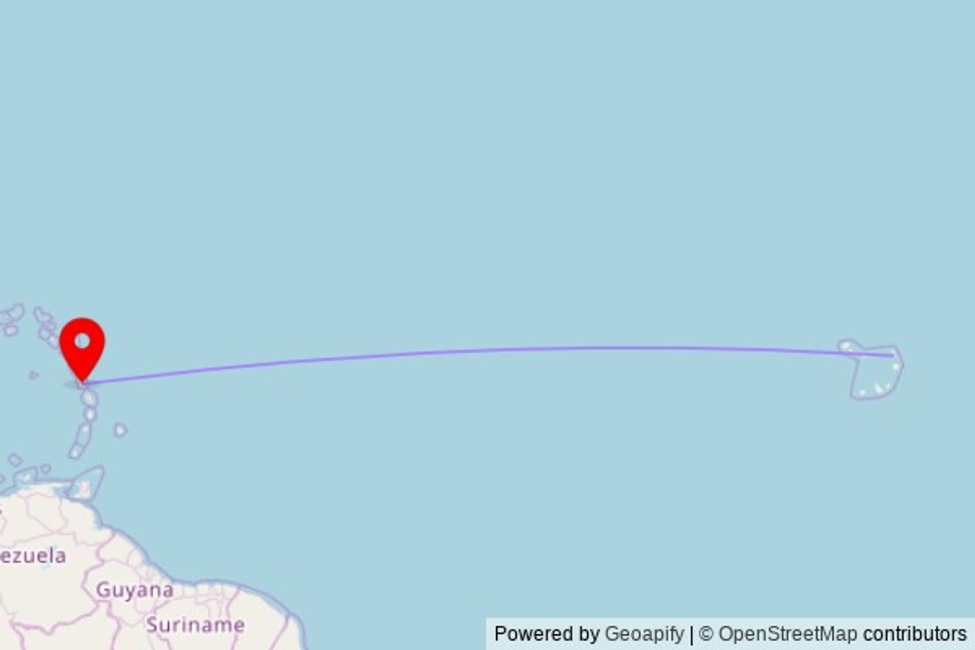 A map showing the great circle route from Santa Maria in Cape Verde to a map pin at Roseau SDA Church, St. John's Avenue, Roseau, Dominica