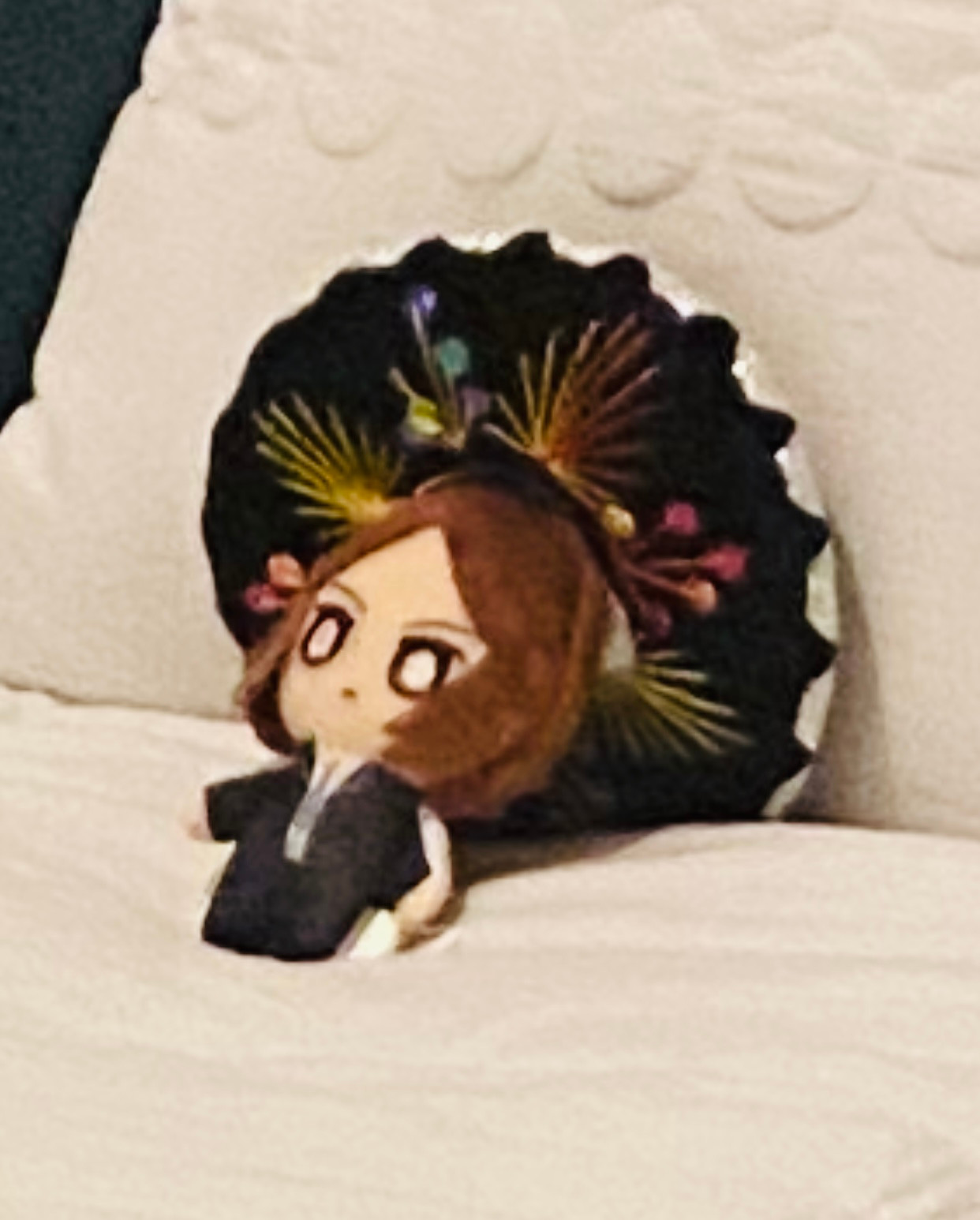 Zoom up on the small Tatsuya plush wearing a giant sombrero laying on a massive bed as he stares vacantly at the ceiling, wondering where his life went wrong