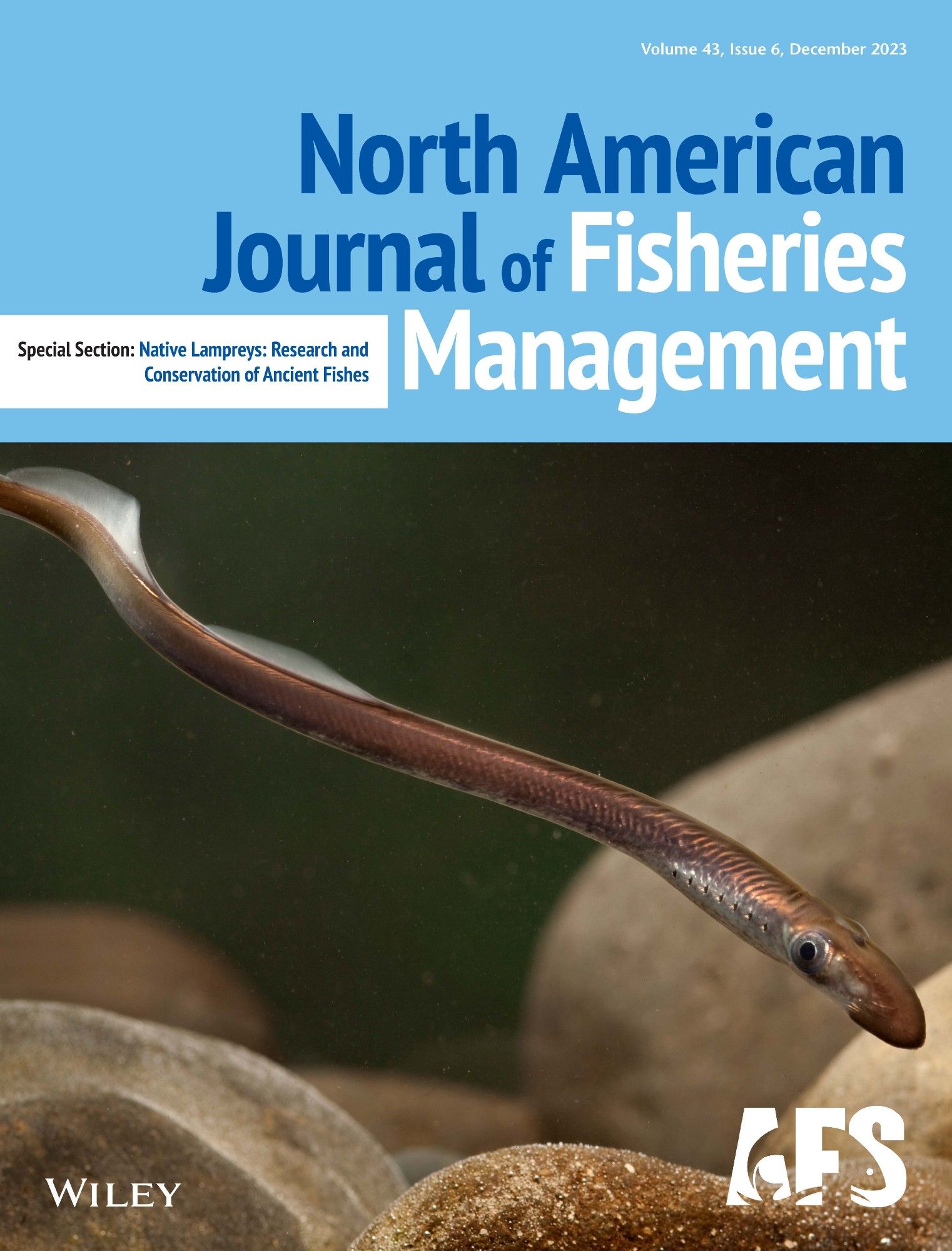 Cover of the December 2023 issue of the North American Journal of Fisheries Management, featuring a Pacific Lamprey. Photo credit: Michael Durham.