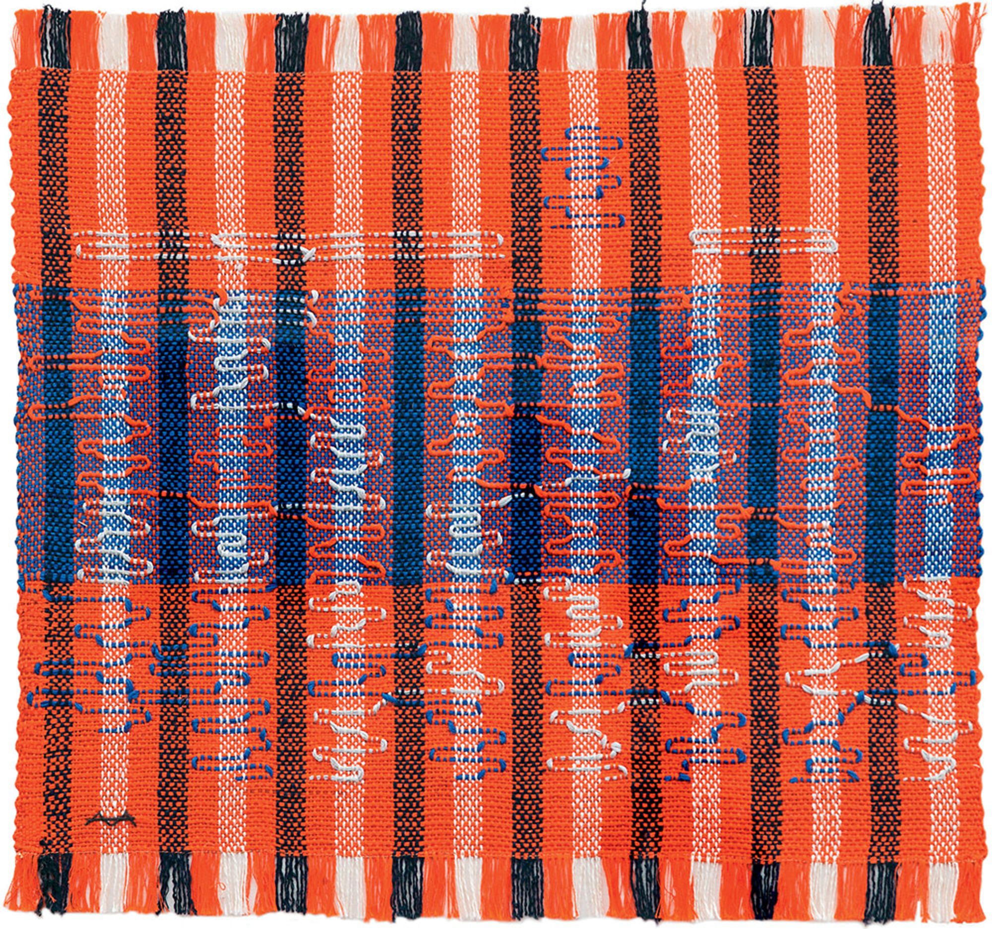 A woven textile in red, blue, black, and white, with meandering pattern woven through it