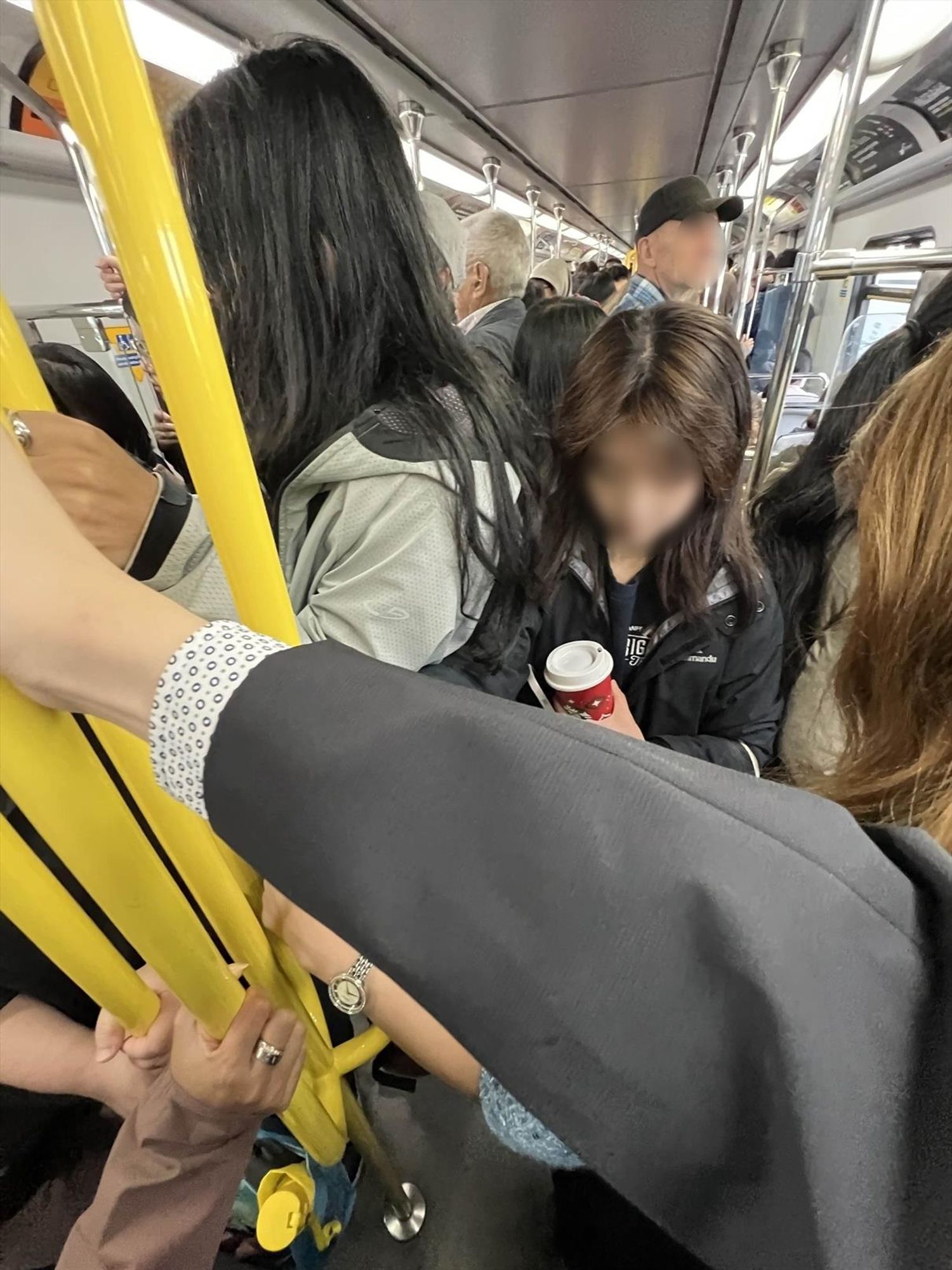 People packed into a crowded train