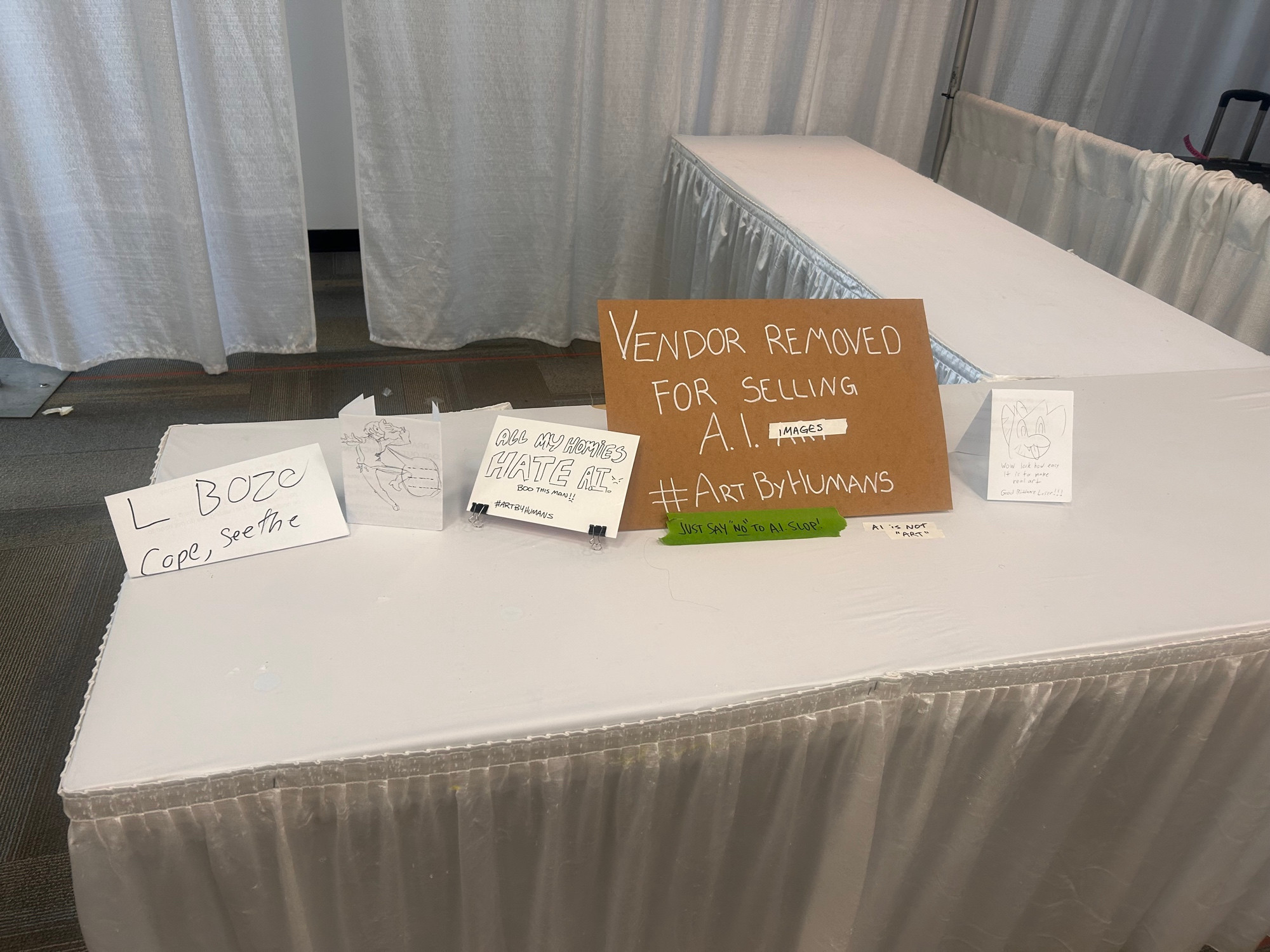 More anti-ai signs on an empty table.
