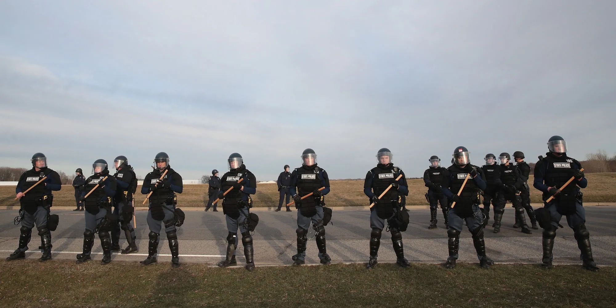 Line of cops in riot gear