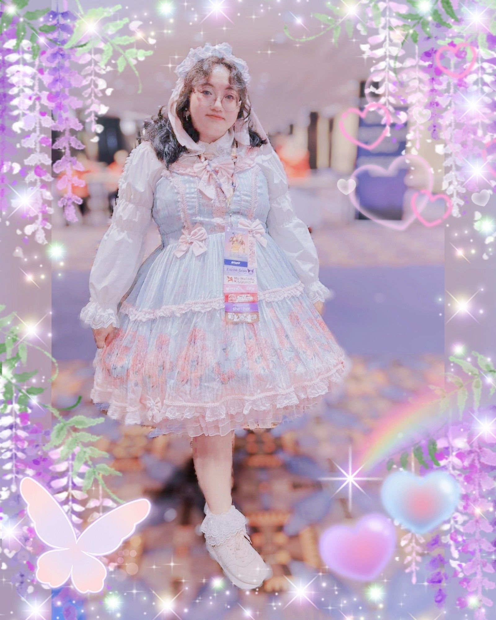 Woman with glasses wearing a sweet lolita coord against a blue carpeted room.

JSK, headdress: Iris Garden x Haenuli mint x pink Romantic Hydrangea
Blouse: Dear my love Emily
Necklace: Puvithel
Socks: Metamorphose temps de fille
Shoes: New Balance