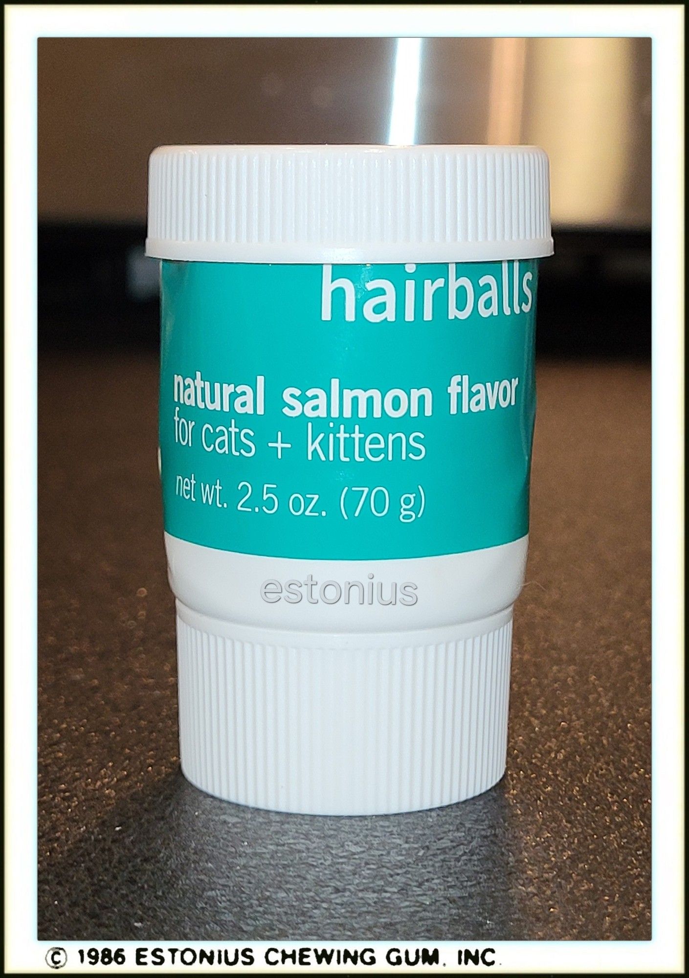 Whenever the tube of anti-hairball paste gets close to empty, I randomly cut off part of the tube in order to gain access to the remaining paste, so as not to waste any, since it is very difficult to squeeze out the remaining paste.

I, then, place a random plastic bottle cap top over the cut area until it is completely empty.

This time, the way I cut it and how the plastic bottle cap top covered it made it read like a Topps' Wacky Packages' trading card sticker to me. =)

Meta Tags: #猫 #neko #gato #katze #고양이 , hair ball, hair balls, cat life ,Topps Wacky Packages Wacky Packs, trading cards, trading card,  #tradingcard , brand parody, Life Hack, Life Hacks