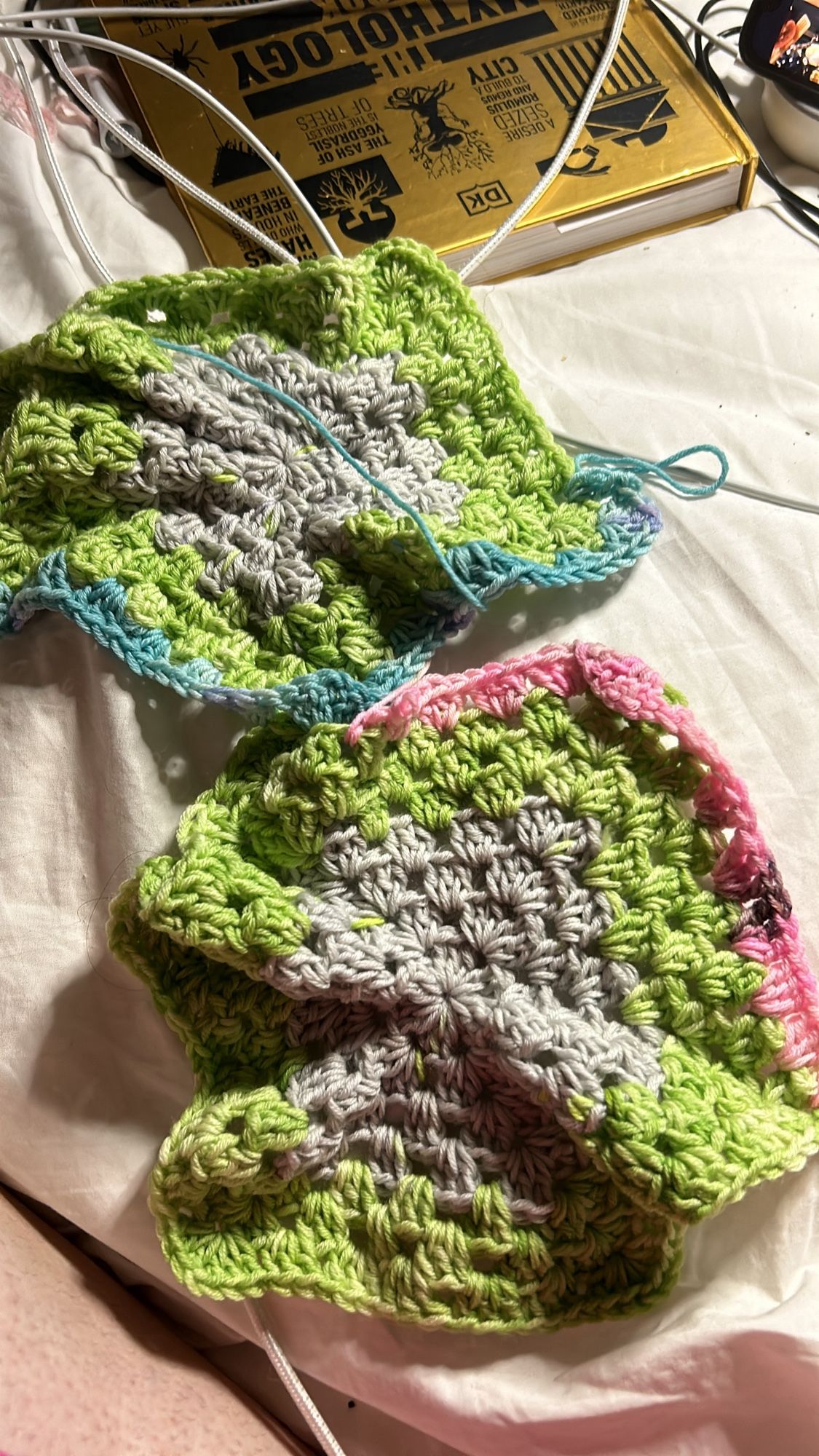 Crochet hexagons using various colours to find good combinations. One green with pink and one green with blue.