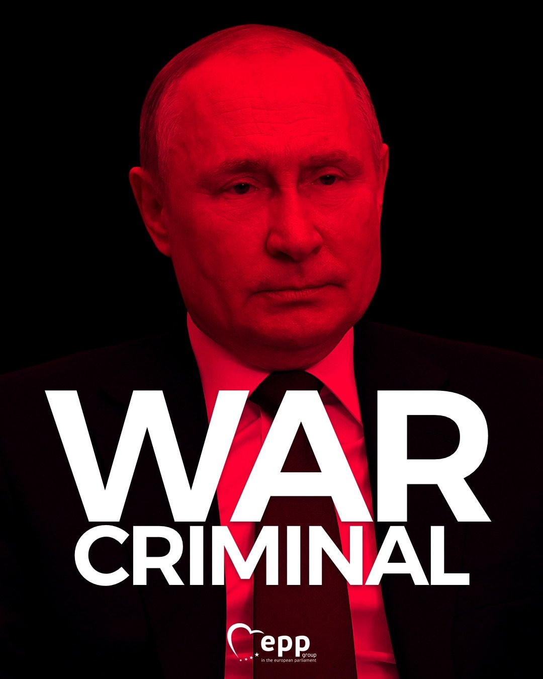 Image of a red tinted Russian dictator Vladimir Putin and the text: "WAR CRIMINAL"