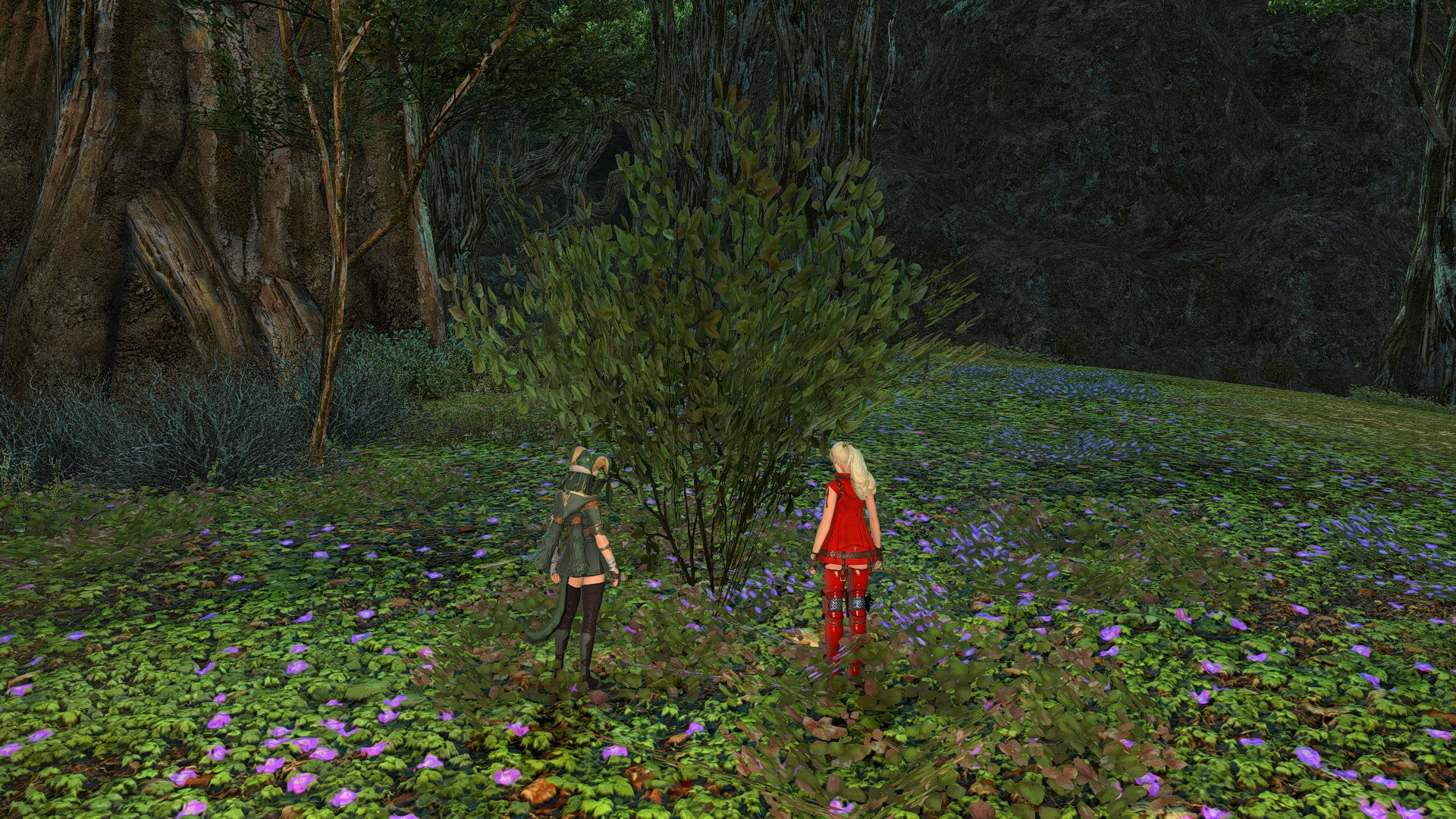 Phoebe and Lyse standing in front of and looking down a large tree in the vein of the cover of 1000 gecs by 100 gecs