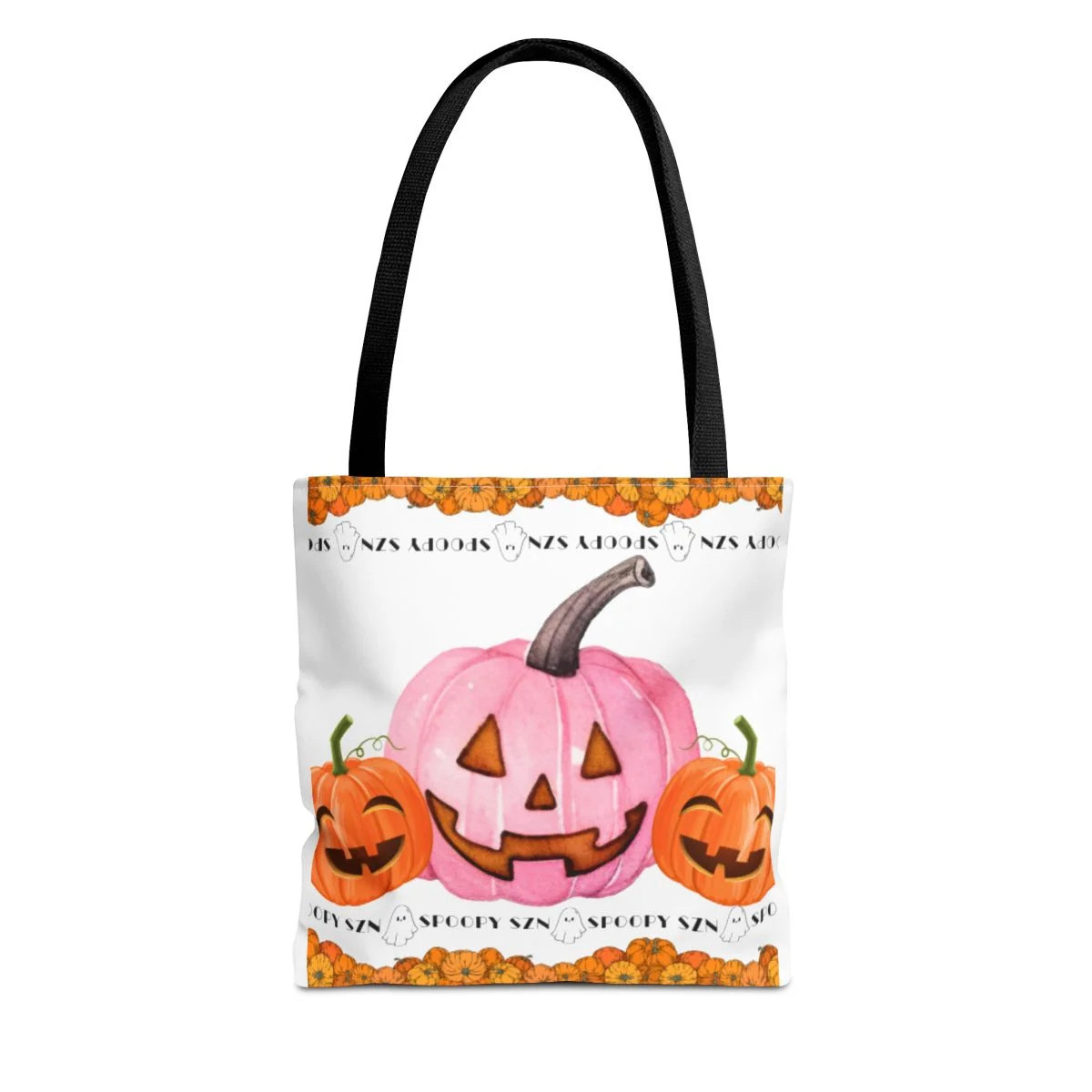 A white tote bag with pumpkins displayed & a banner that says “Spoopy szn” across the top and bottom