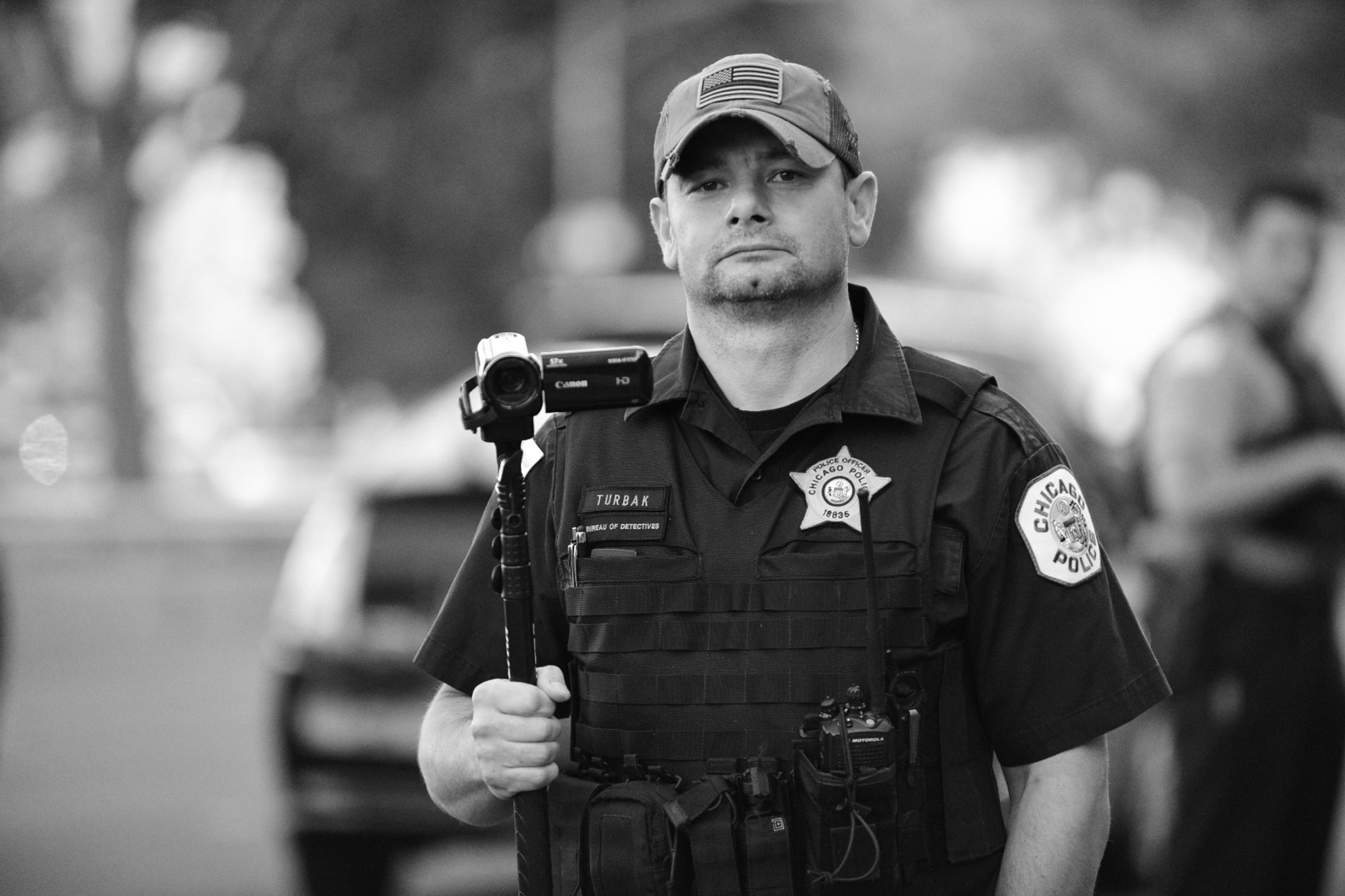 Officer filming protesters