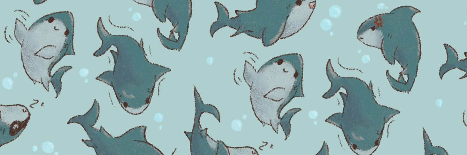 A pattern of small, cute, cartoonish sharks.