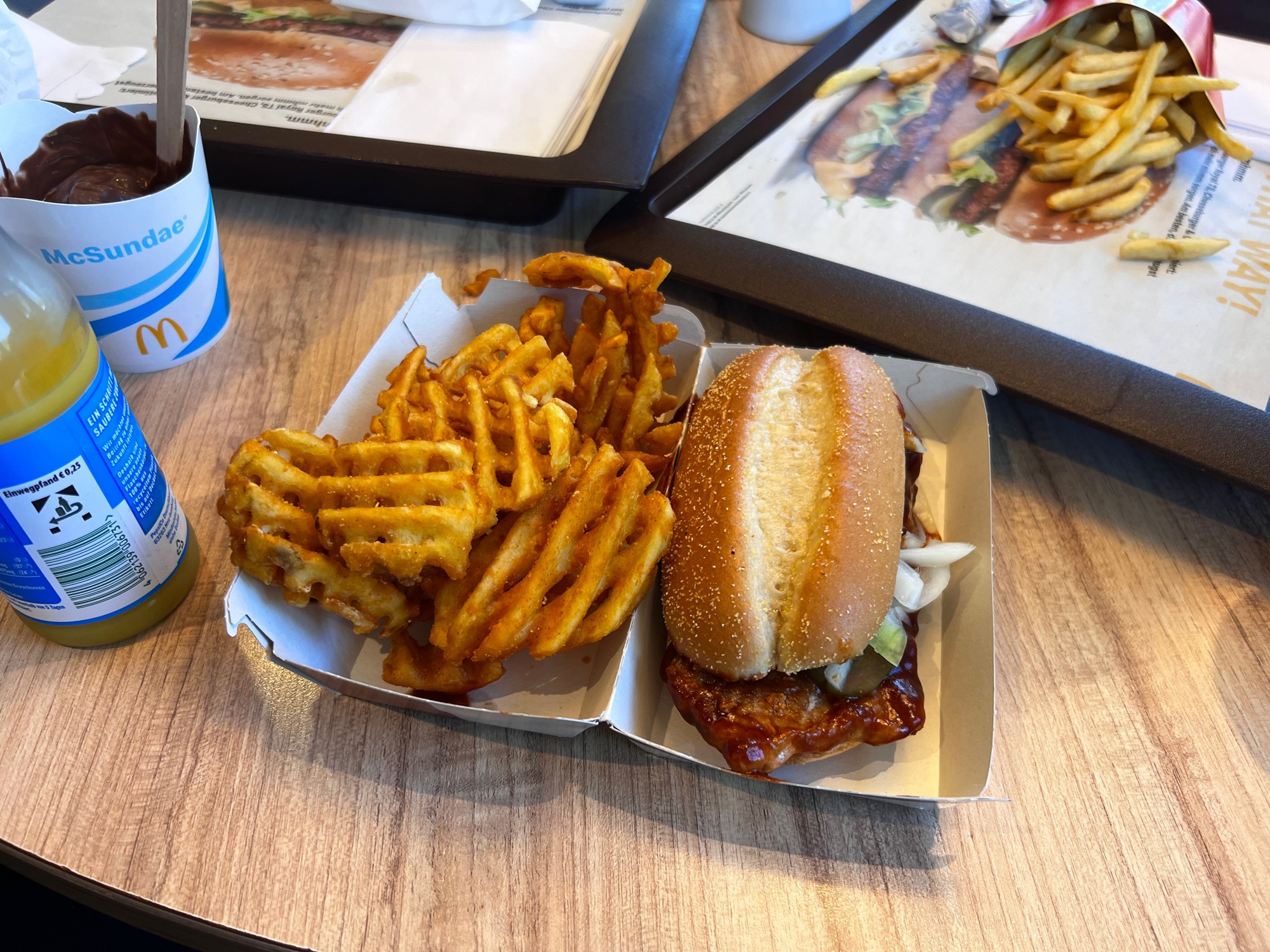 Photo of a McRib and some Waffle Fries from McDonald’s