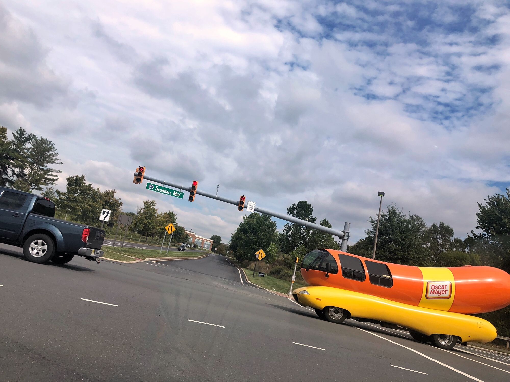 Yeah I took a photo of the Oscar Mayer Wienermobile while driving which is why this is all tilted and framed funny since I just held the phone and shot without looking at the screen as I'm not a complete psychopath and kept my attention on the road in front of me.