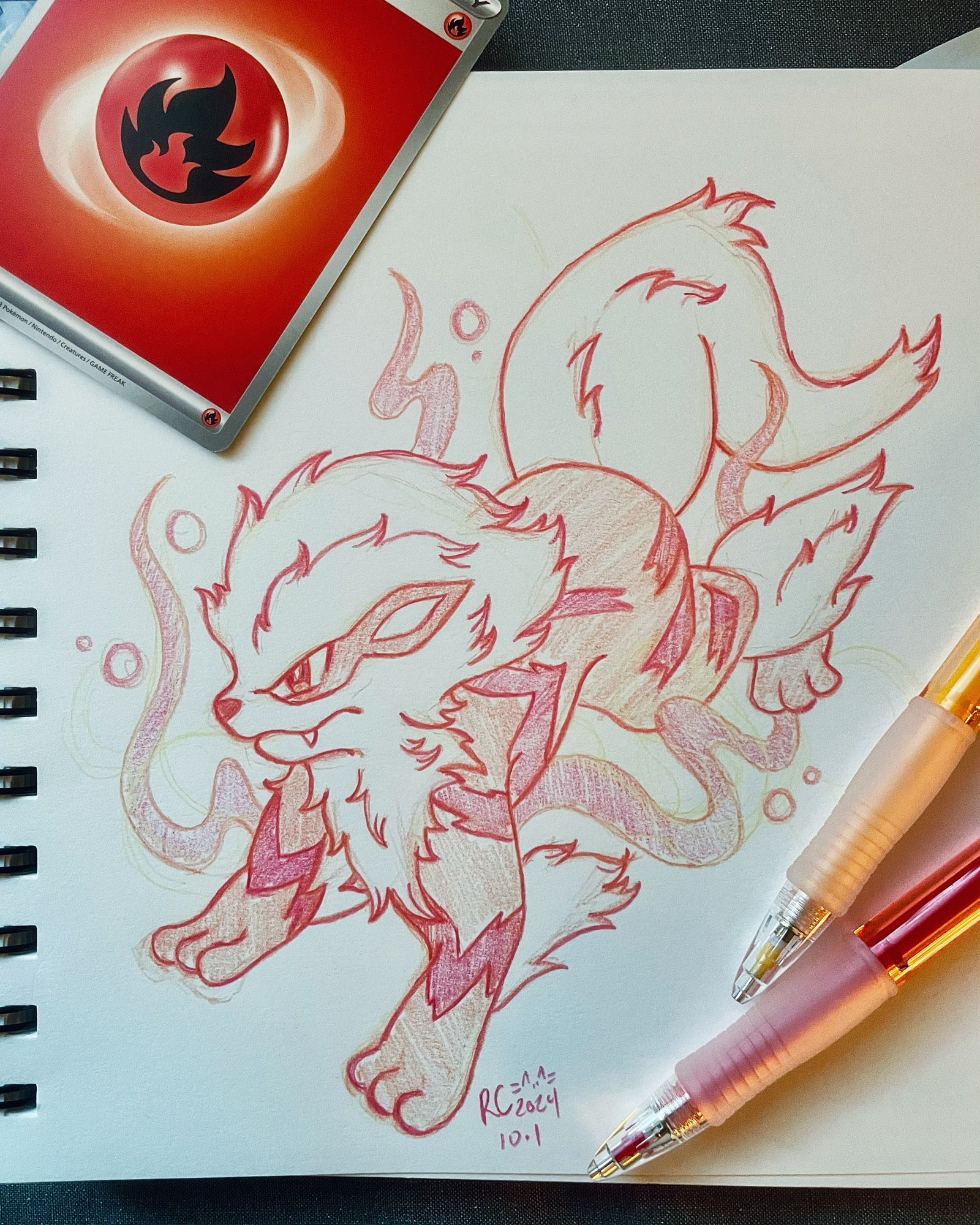 Sketch of Pokémon Arcanine in red and orange pencil