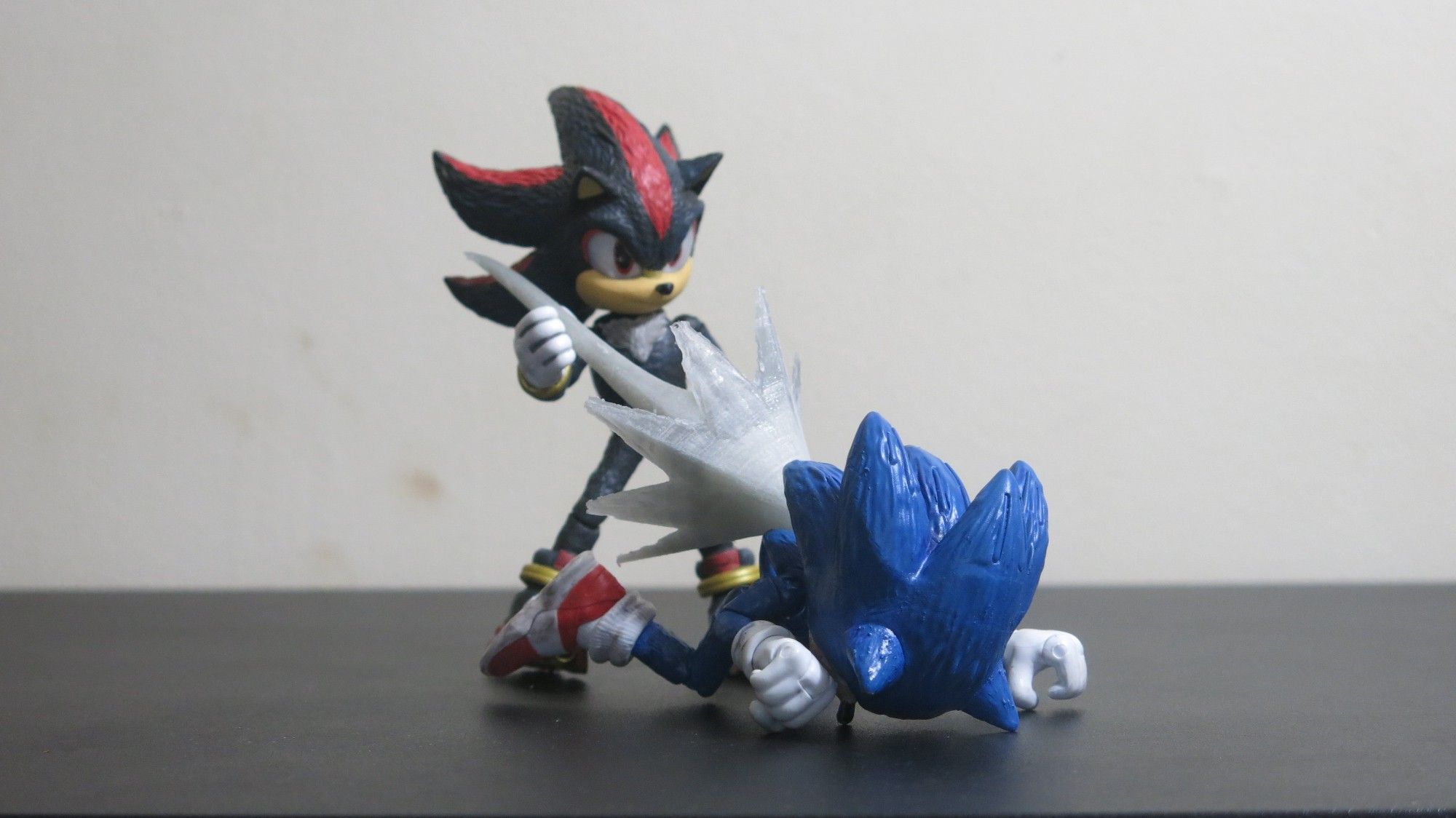 Shadow Chaos Spearing Sonic in the back, Sonic is on the ground