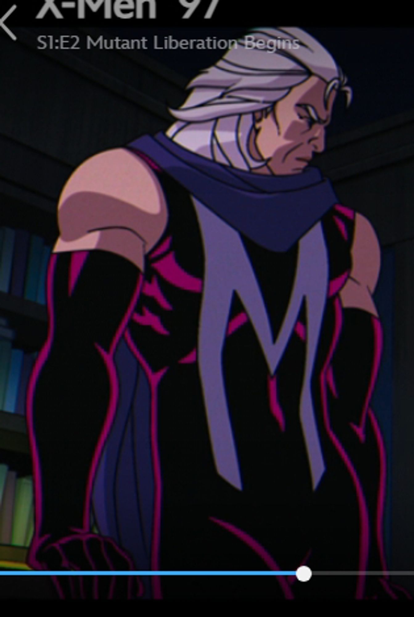 Magneto from Xmen 97, wearing purple opera length gloves and matching bodysuit and a lavender scarf. He has a giant M on his chest.