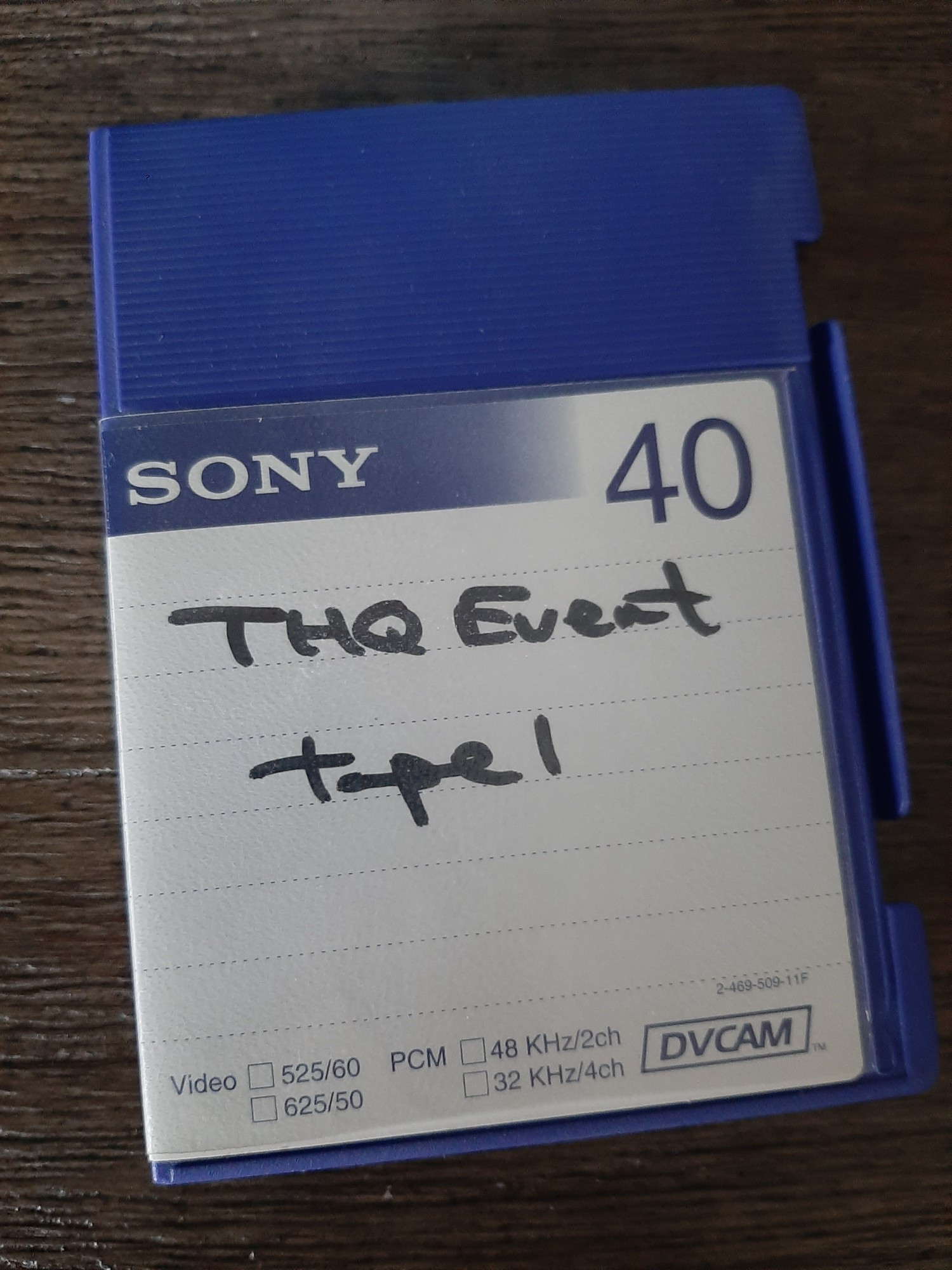 DVCAM tape with THQ Event tape 1 written on the cover.