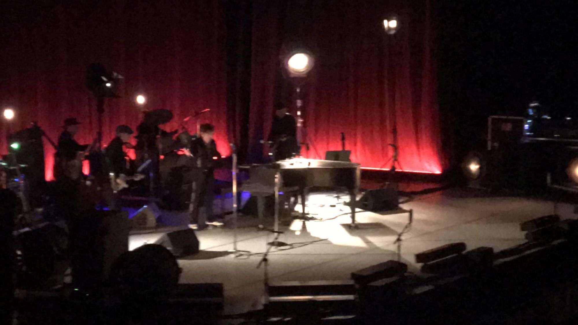 Bob Dylan and band on stage