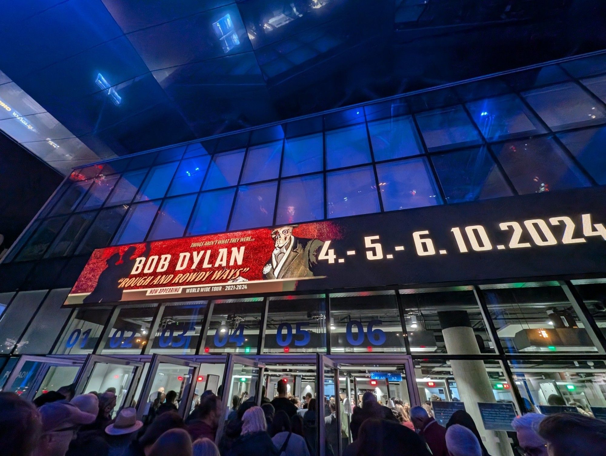 Bob Dylan marquee photo of electronic banner on exterior of venue building