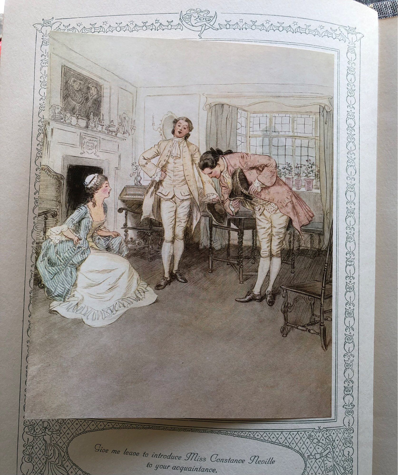 25 tip in color plates by Hugh Thomson illustrate scenes in play. This one is frontis or first plate showing a gentleman in pink coat bowing to a lady in white and green dress while another gentleman watches.