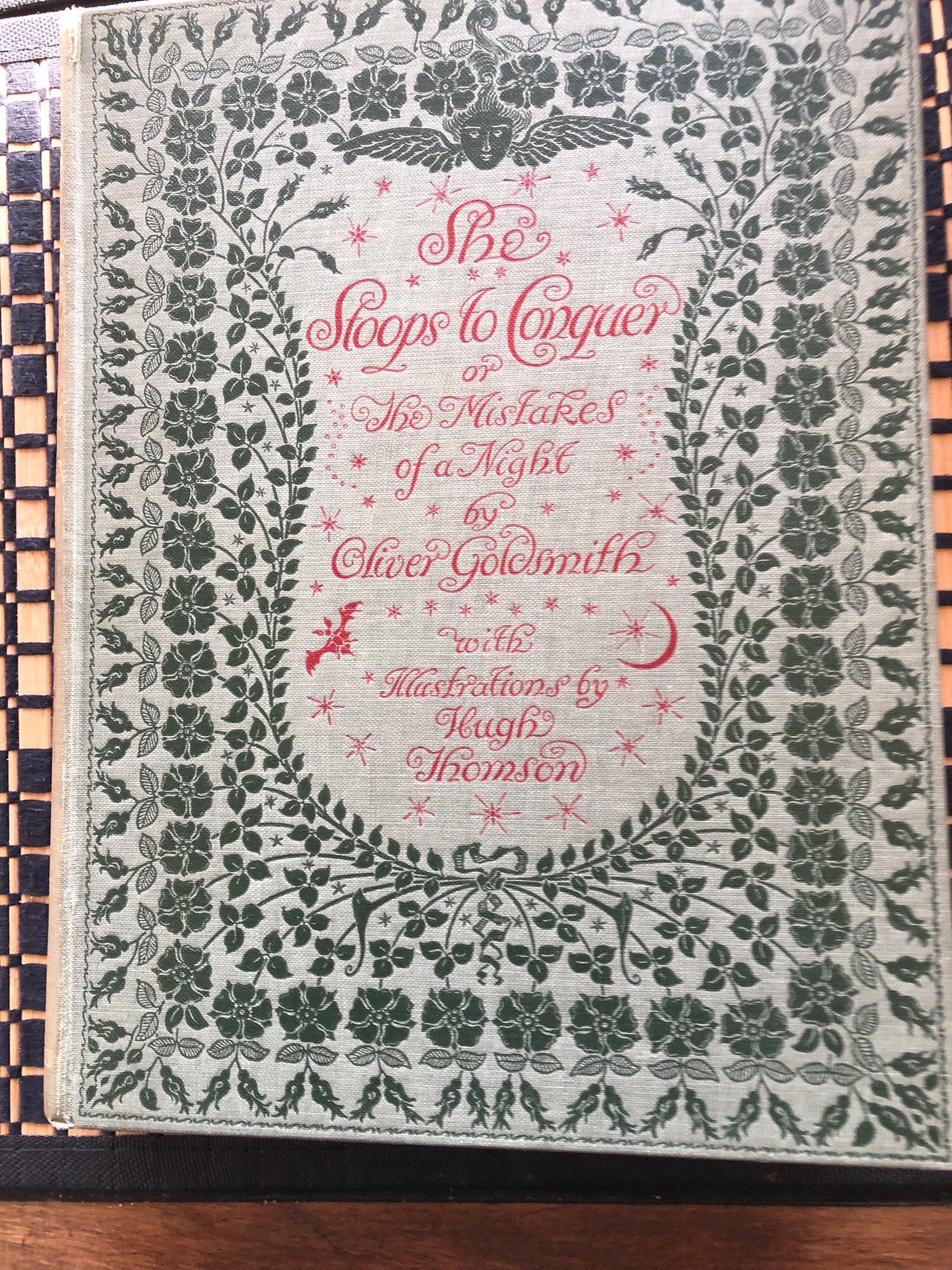 Early 20th century copy of She Stoops to Conquer illustrated by Hugh Thomson with elaborate cover decoration in pink and green