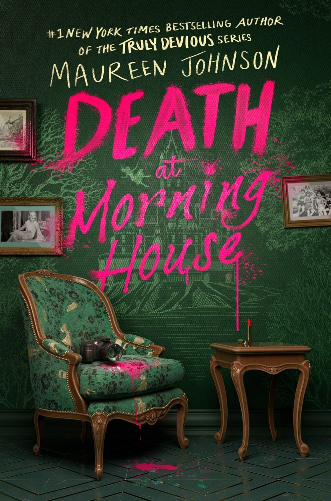 Book cover of Death at Morning House. The title is written in bright pink, like a graffiti painted on the green wall behind it. There are a few photographs on the wall, a chair with a camera on it, and a table to the side with a bright lipstick on top of it.