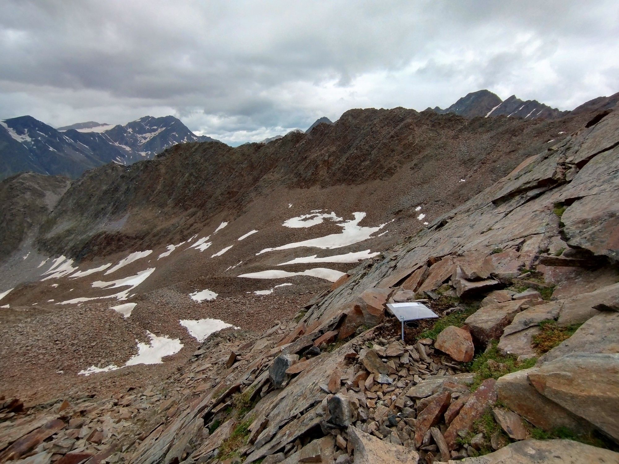 A pitfall trap installed at 3100m in the steep slopes of a mountain peak.