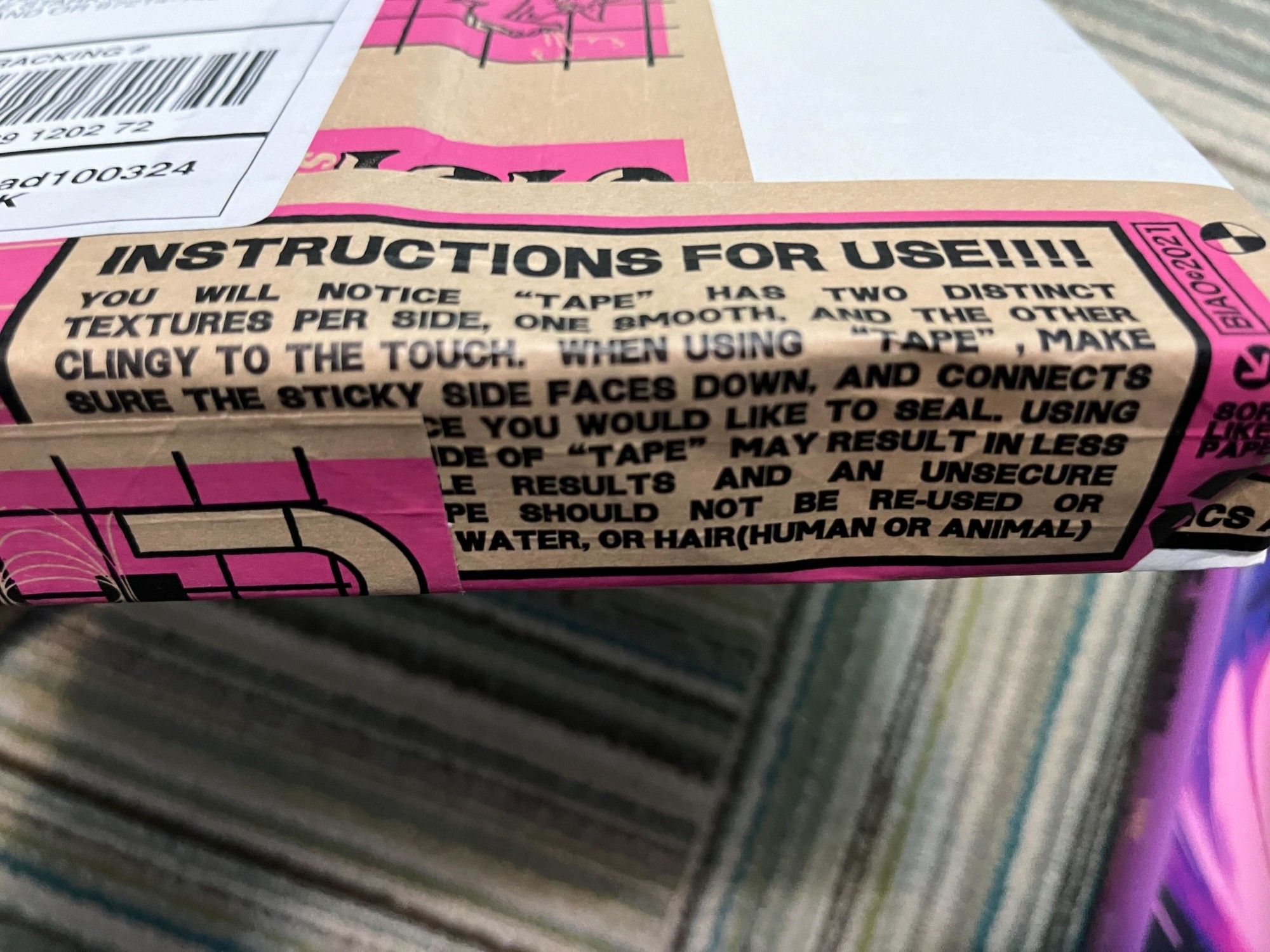 Brown packing tape on a package printed with the text (some is obscured by another piece of tape):
Instructions for use!!!
You will notice "Tape" has two distinct textures per side, one smooth, and the other clingy to the touch. When using "Tape", make sure the sticky side faces down, and connects [...]de you would like to seal. Using [...]ide of "Tape" may result in less [...]le results and an unsecure [...]pe should not be re-used or [...]water, or hair (human or animal)