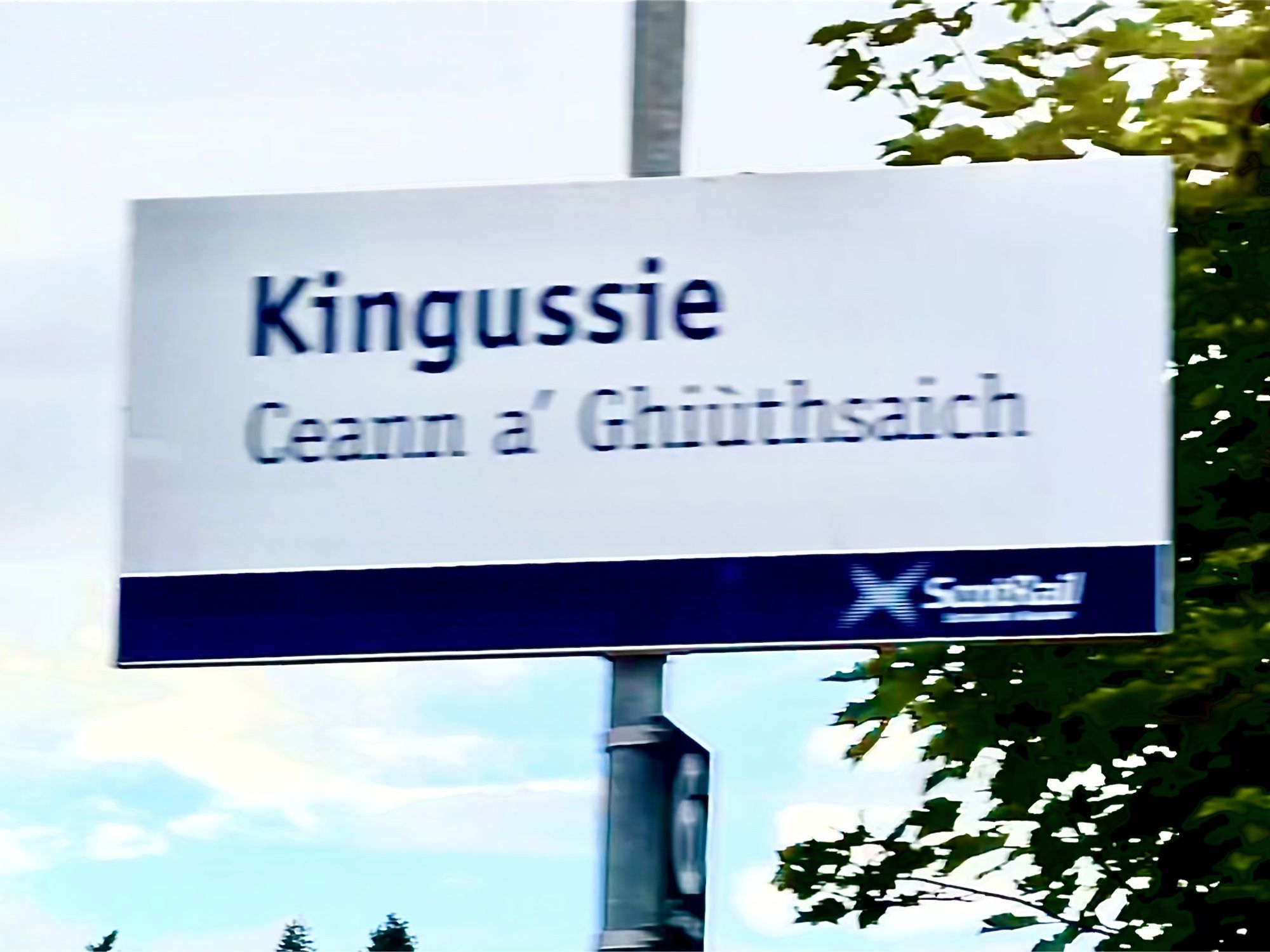 Scottish railway sign showing the town name of  “Kingussie”. Look, friend, I don’t name these things.