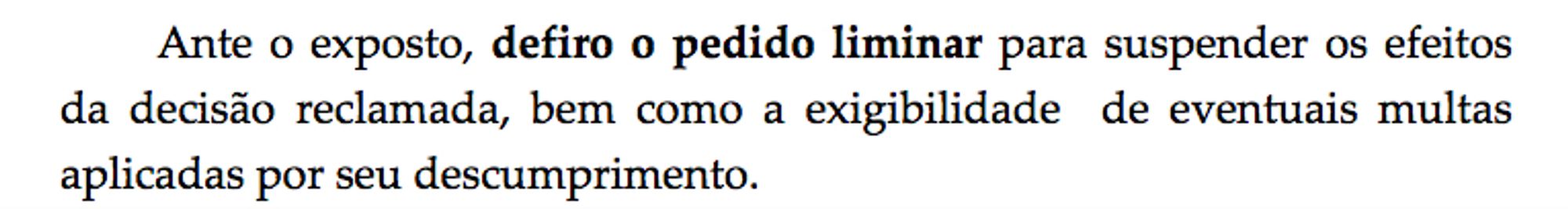 Print de tela do texto, dizendo "Ante o exposto, defiro o pedido liminar para suspender os efeitos da decisão reclamada, bem como a exigibilidade de eventuais multas aplicadas por seu descumprimento."