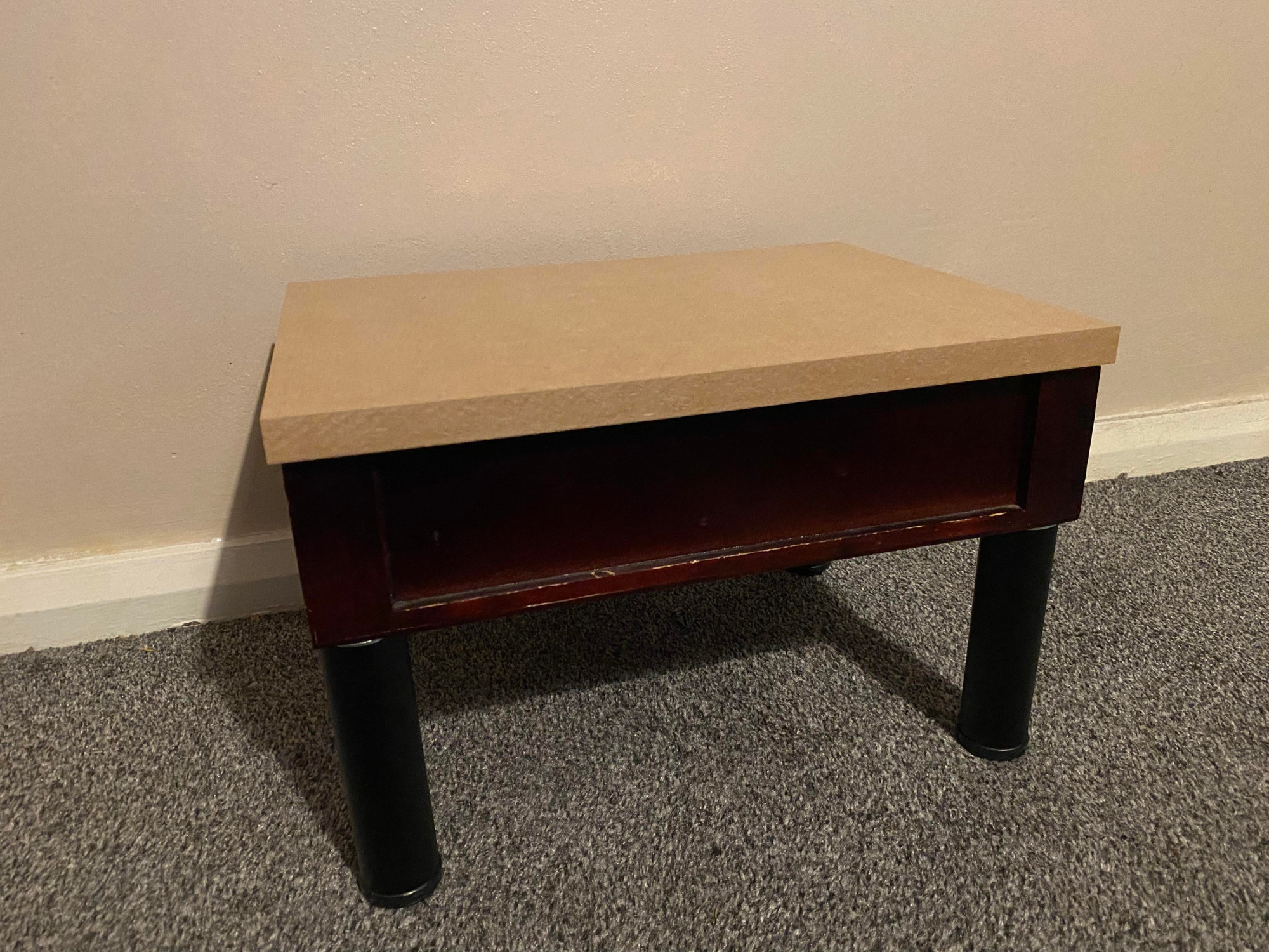 Footstool with a new MDF lid. Front view.