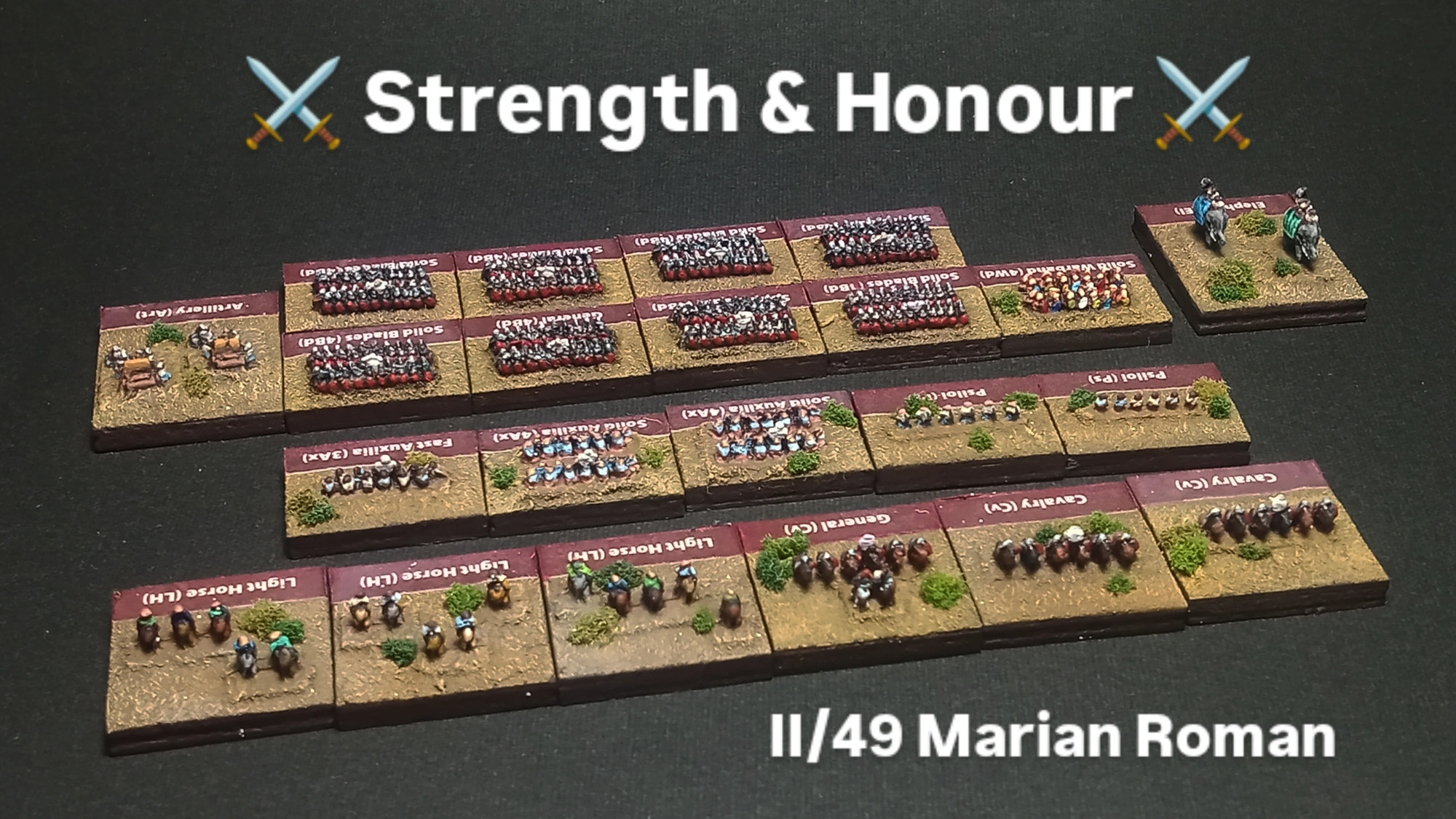 A photo of a 2mm scale wargaming miniatures mounted on 20mm wide bases, representing a Marian Roman army.