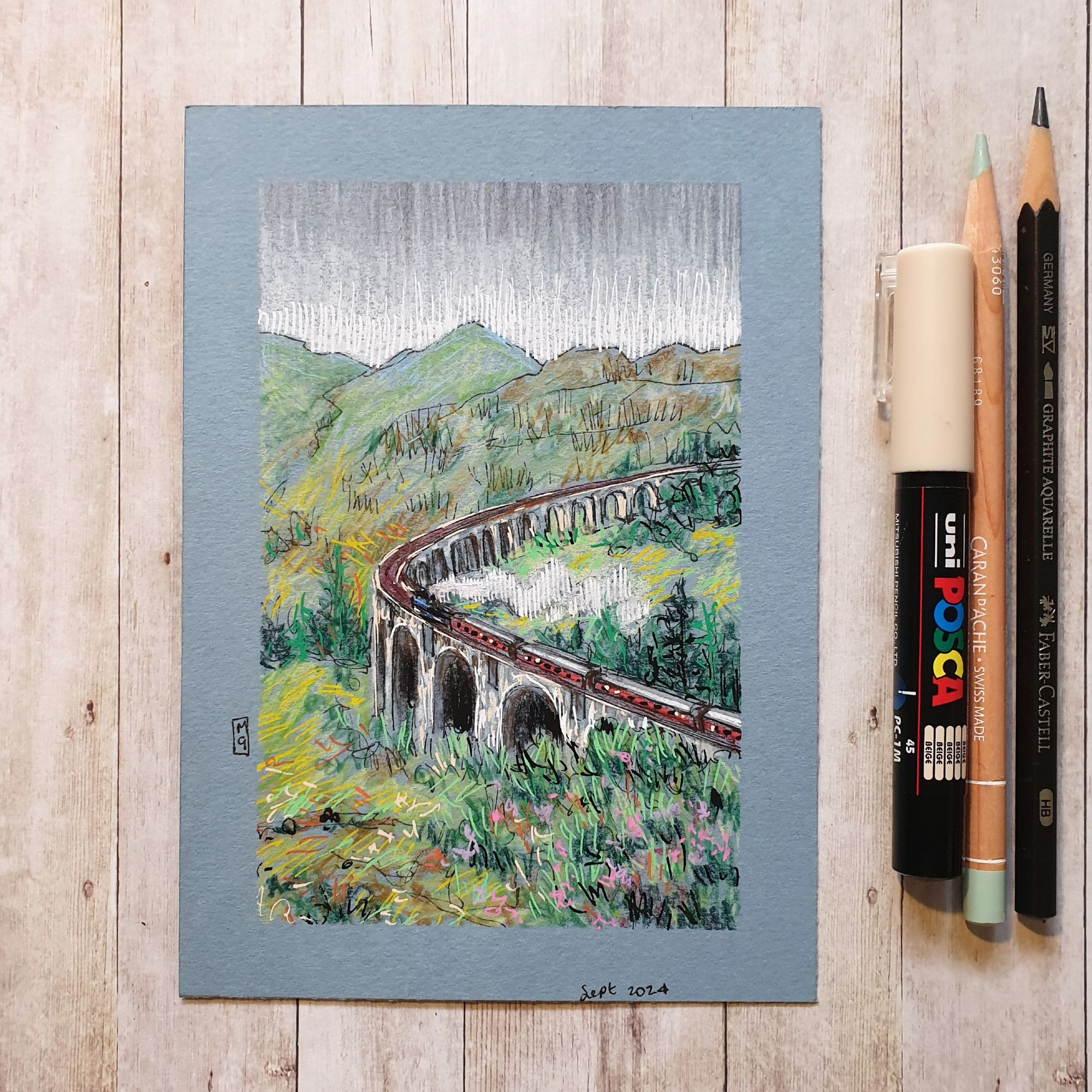 Original drawing - Over the Glenfinnan Viaduct
A colour drawing of the steam train, The Jacobite, crossing the Glenfinnan Viaduct on the West Highland Line in the Highlands of Scotland.
Materials: colour pencil, mixed media, acid free blue pastel paper
Width: 5 inches
Height: 7 inches