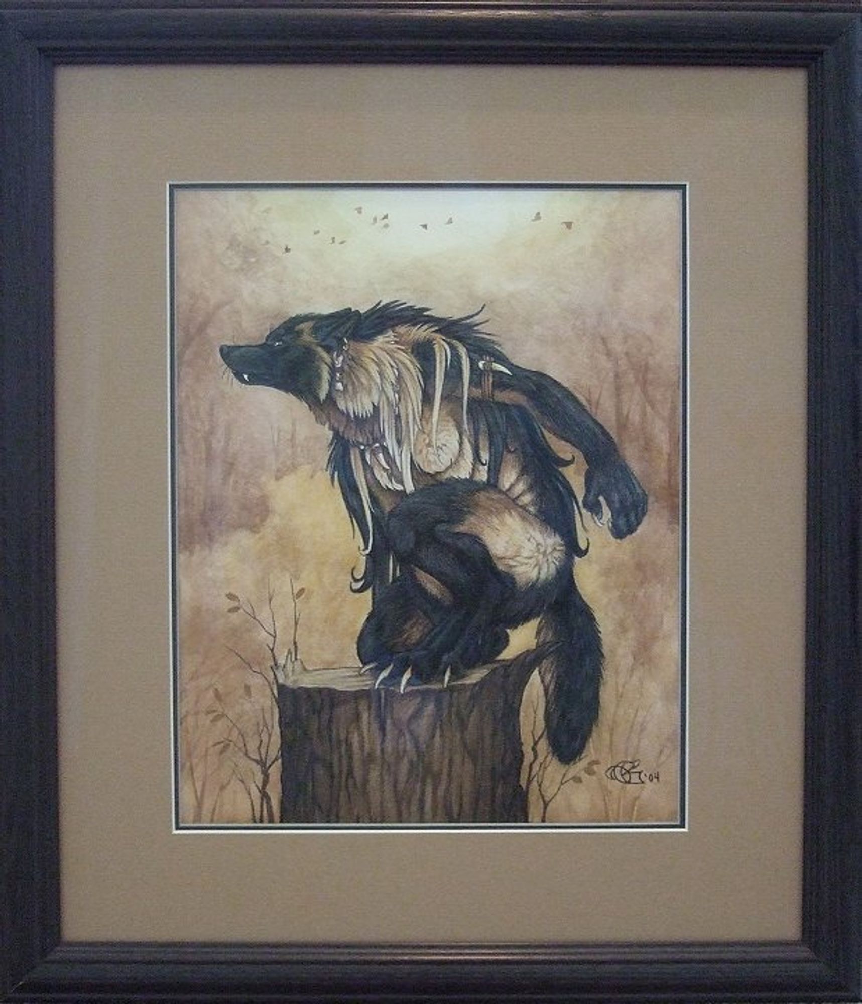 Photo of an original watercolor and colored pencil piece of a crouching werewolf, double matted and framed