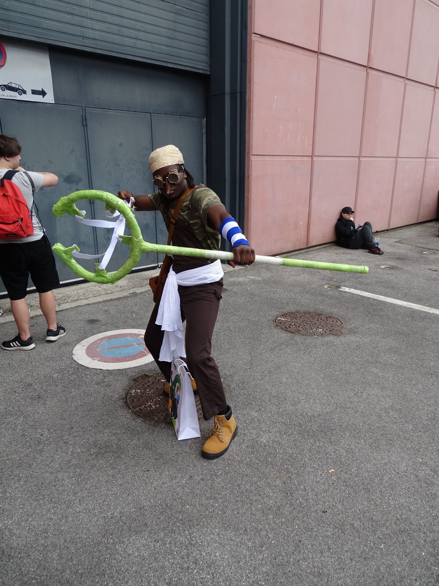 Great Usopp Cosplay from One Piece, including the famous long nose and also the long 5 rubber-bands Slingshot, at Japan Expo Paris 2024.