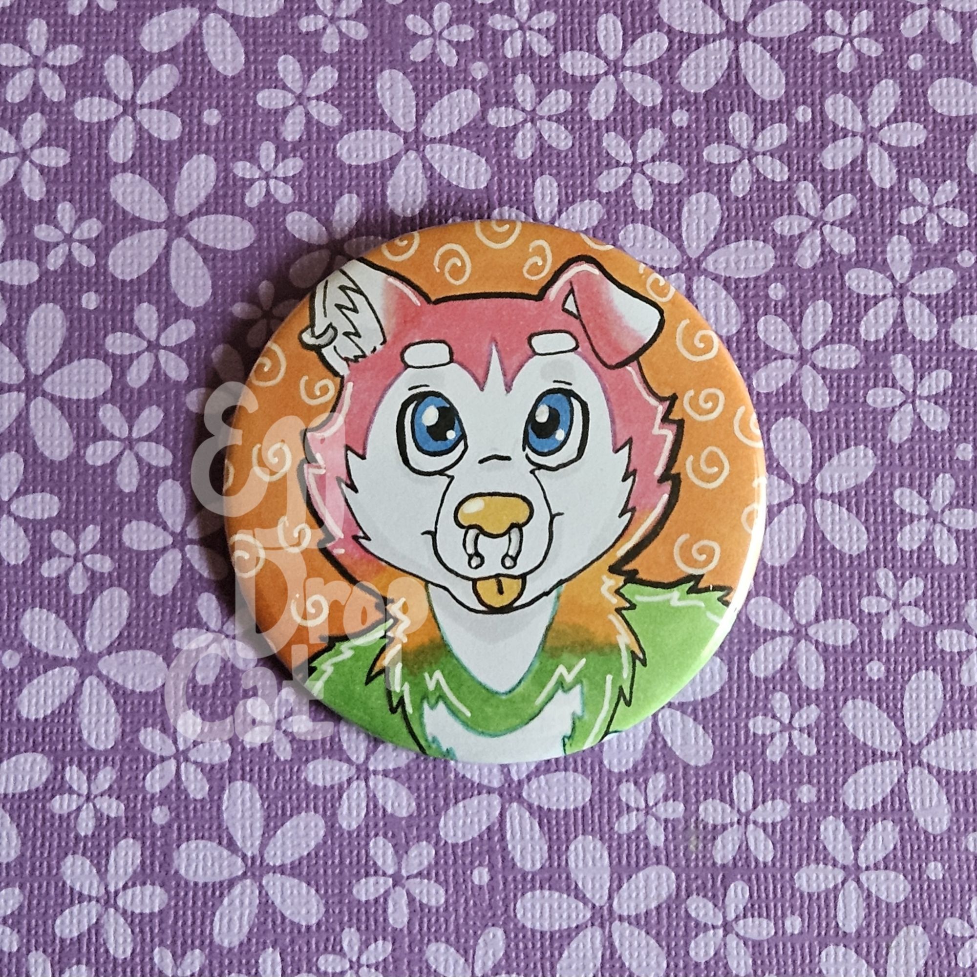 A button of a rainbow dog fursona with a septum piercing