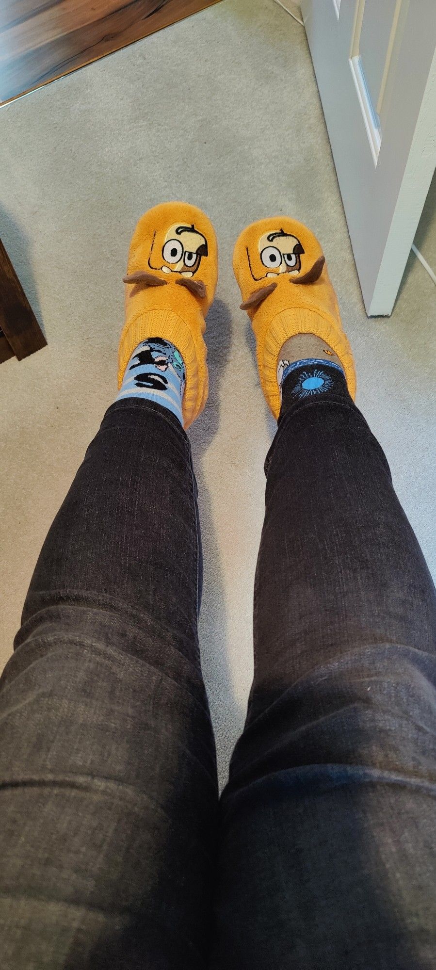 Picture shows two legs wearing jeans which are only about an inch shorter than full-length jeans.