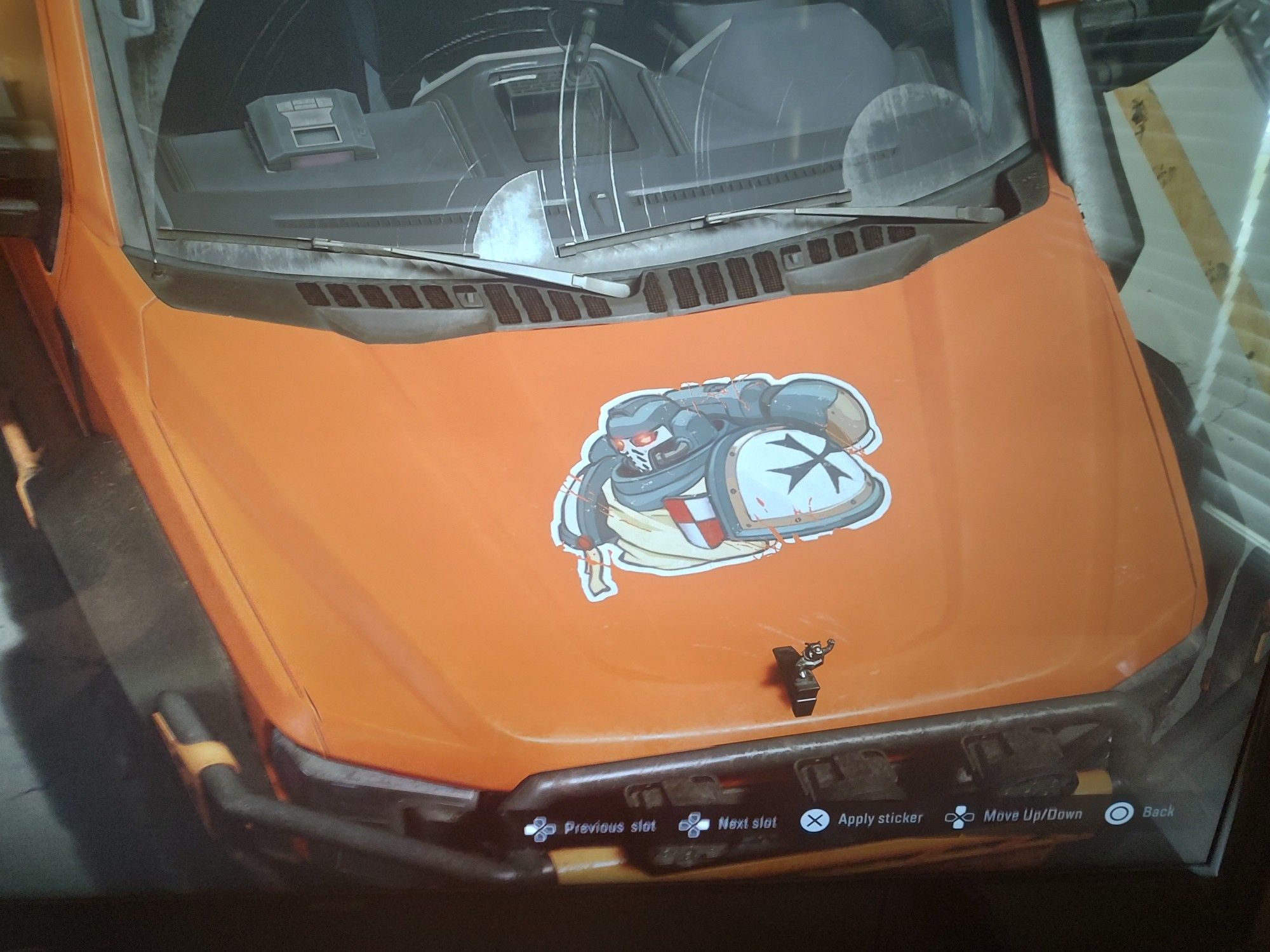 A truck decal on the hood in Snowrunner depicting a Space Marine