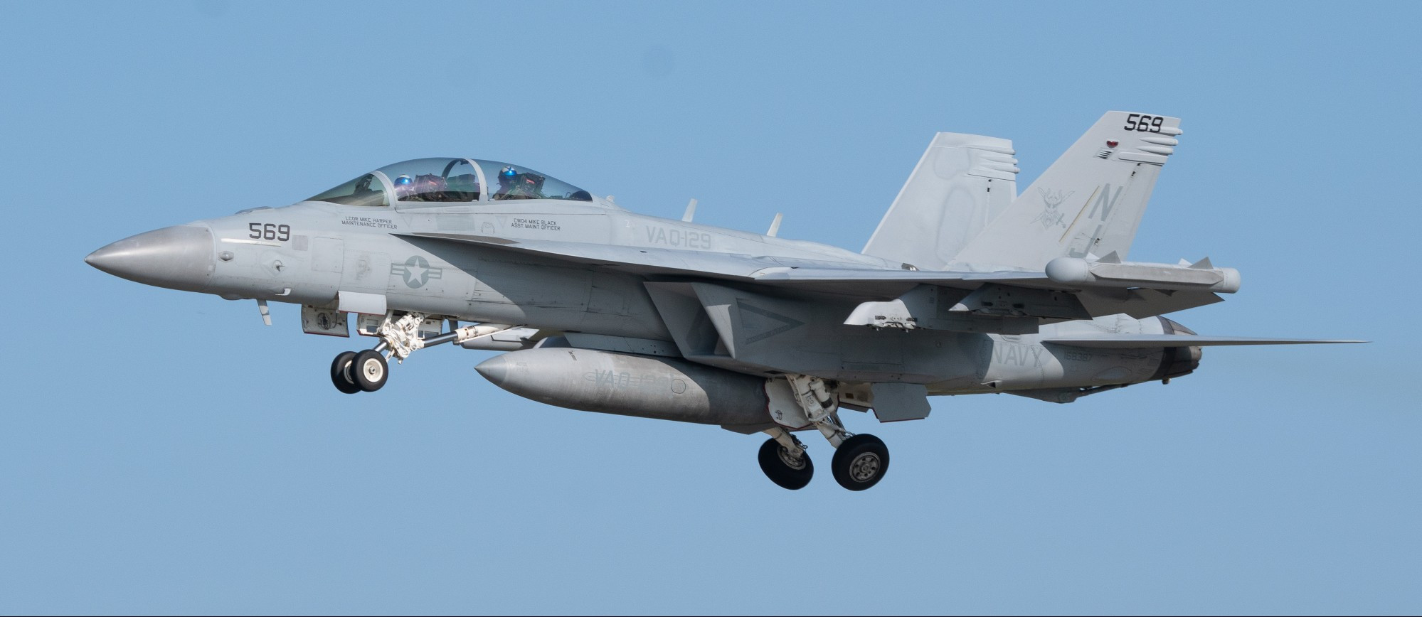 Left facing side profile of a US Navy EA-18G Growler. 