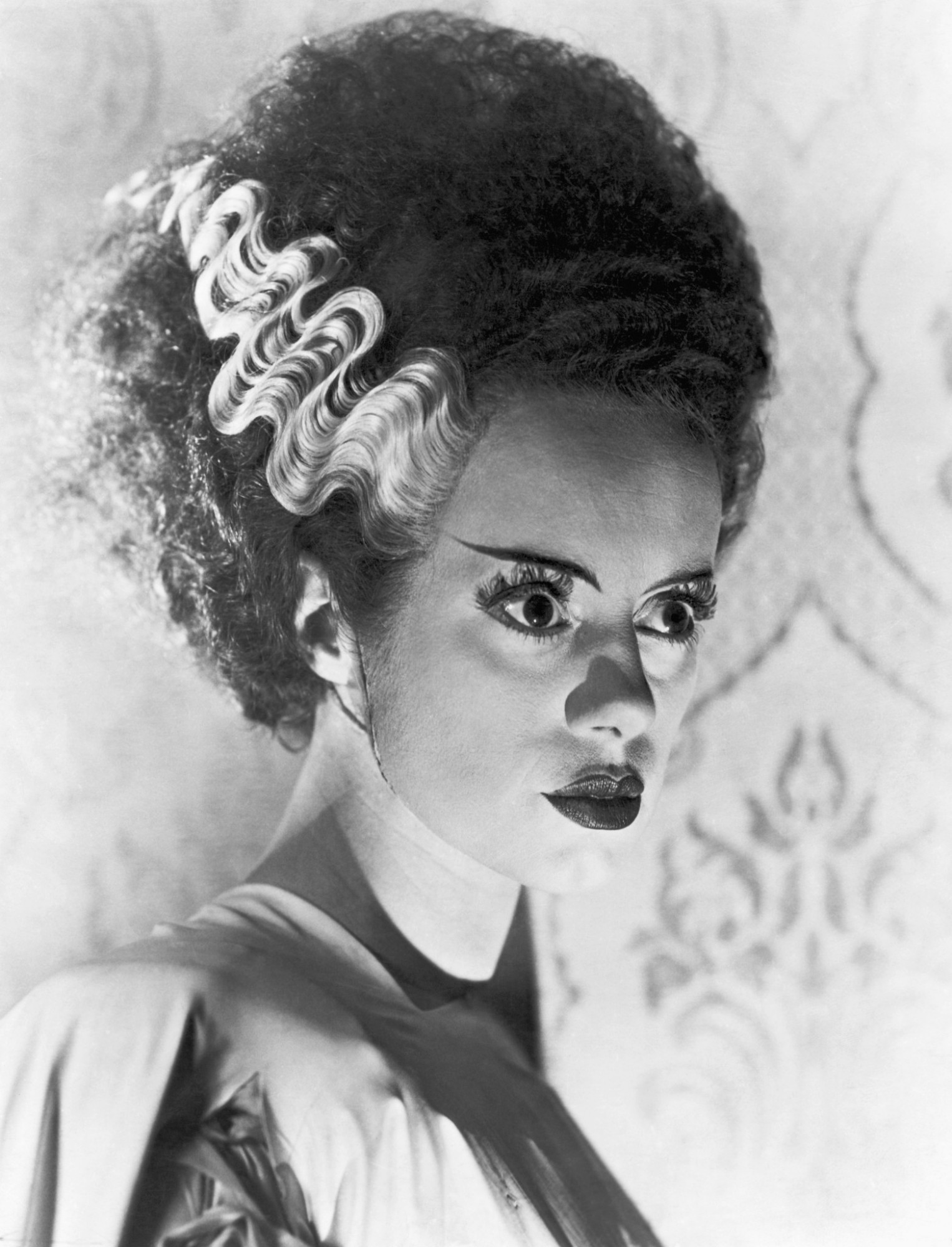 An image of bride of Frankenstein, showing her hair swept up away from her nape