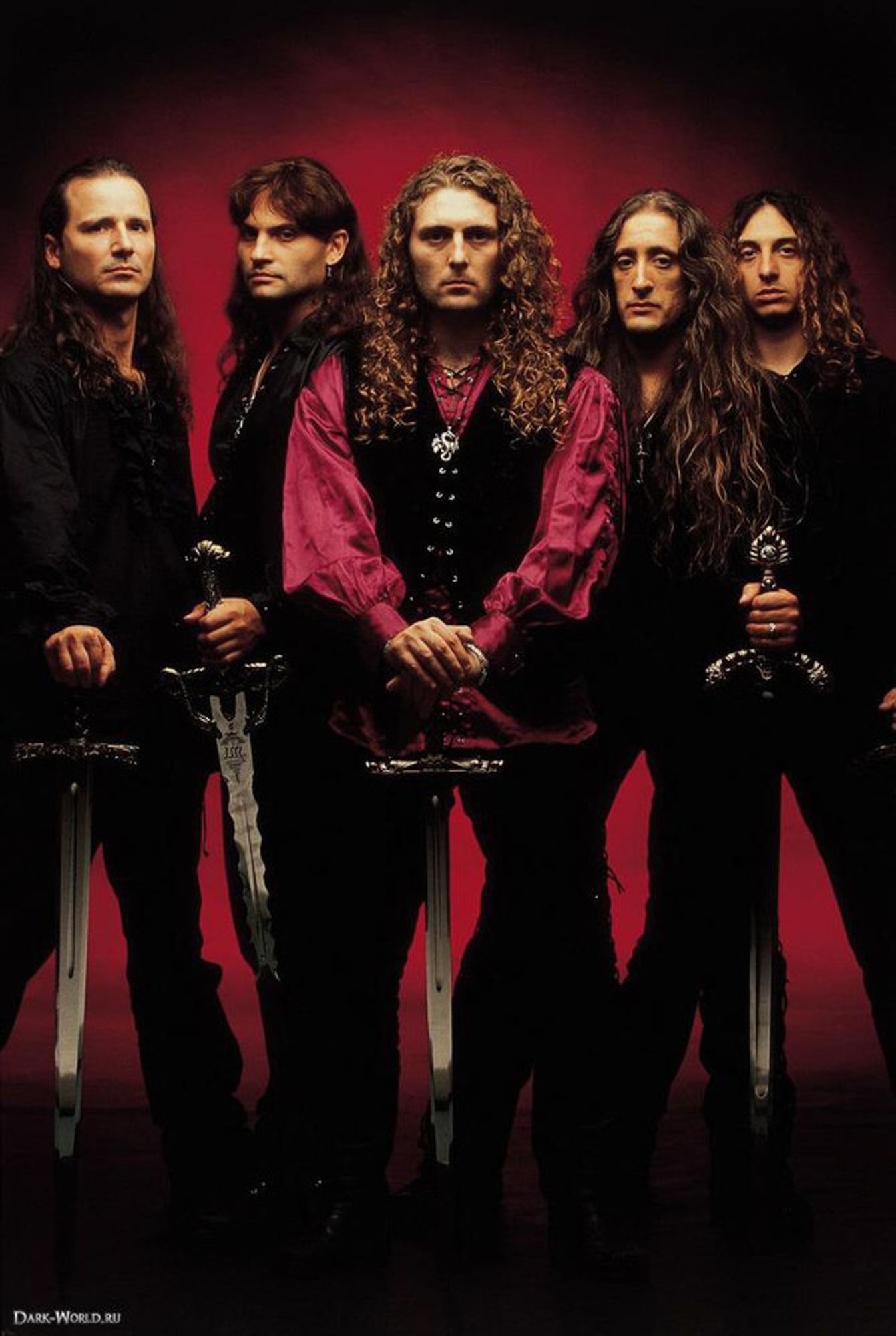 five dudes with long hair and swords all looking Very Seriously at the camera