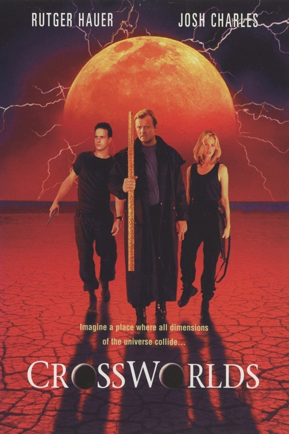 Crossworlds, starring Rutger Hauer and Josh Charles. The image shows two men and a woman standing in a red desert with the moon behind them with lightning coming out from behind it.