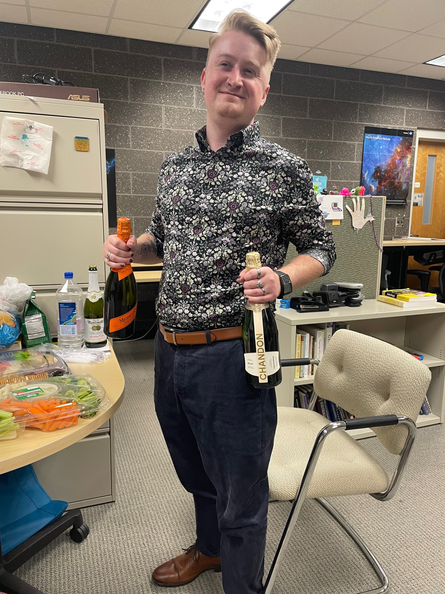 Photo of me holding champagne in celebration