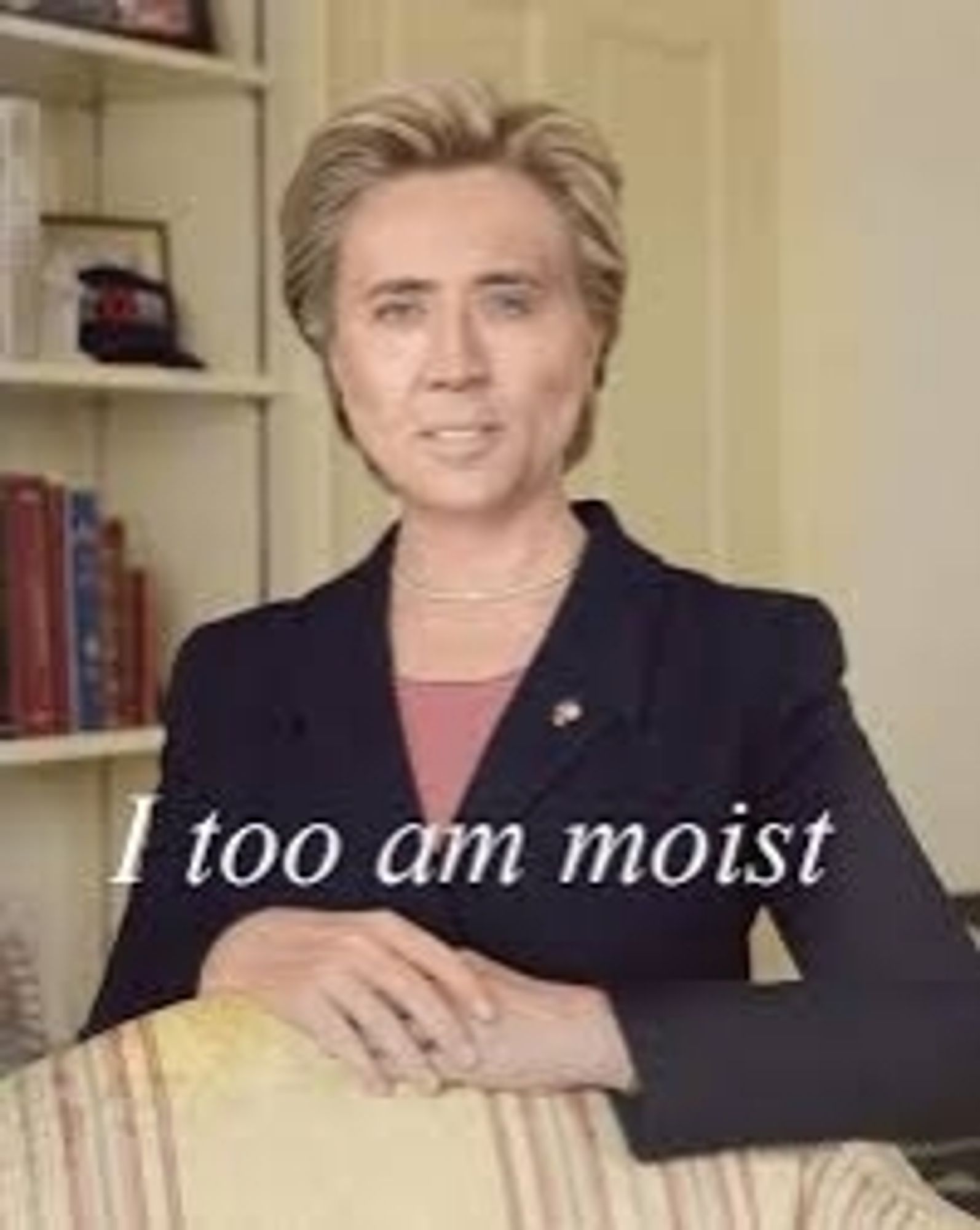 Nicolas Cage looking like Hillary Clinton saying, "I too am moist".