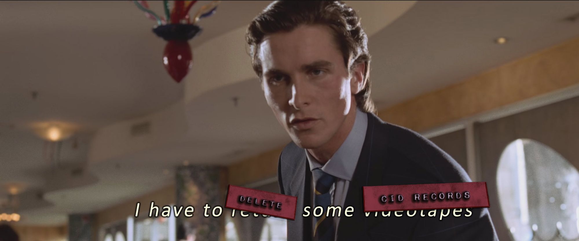 Patrick Bateman character from American psycho meme, wearing a suit in a busy restaurant. Caption is edited with labels to read:
'I have to [DELETE] some [CID RECORDS]'