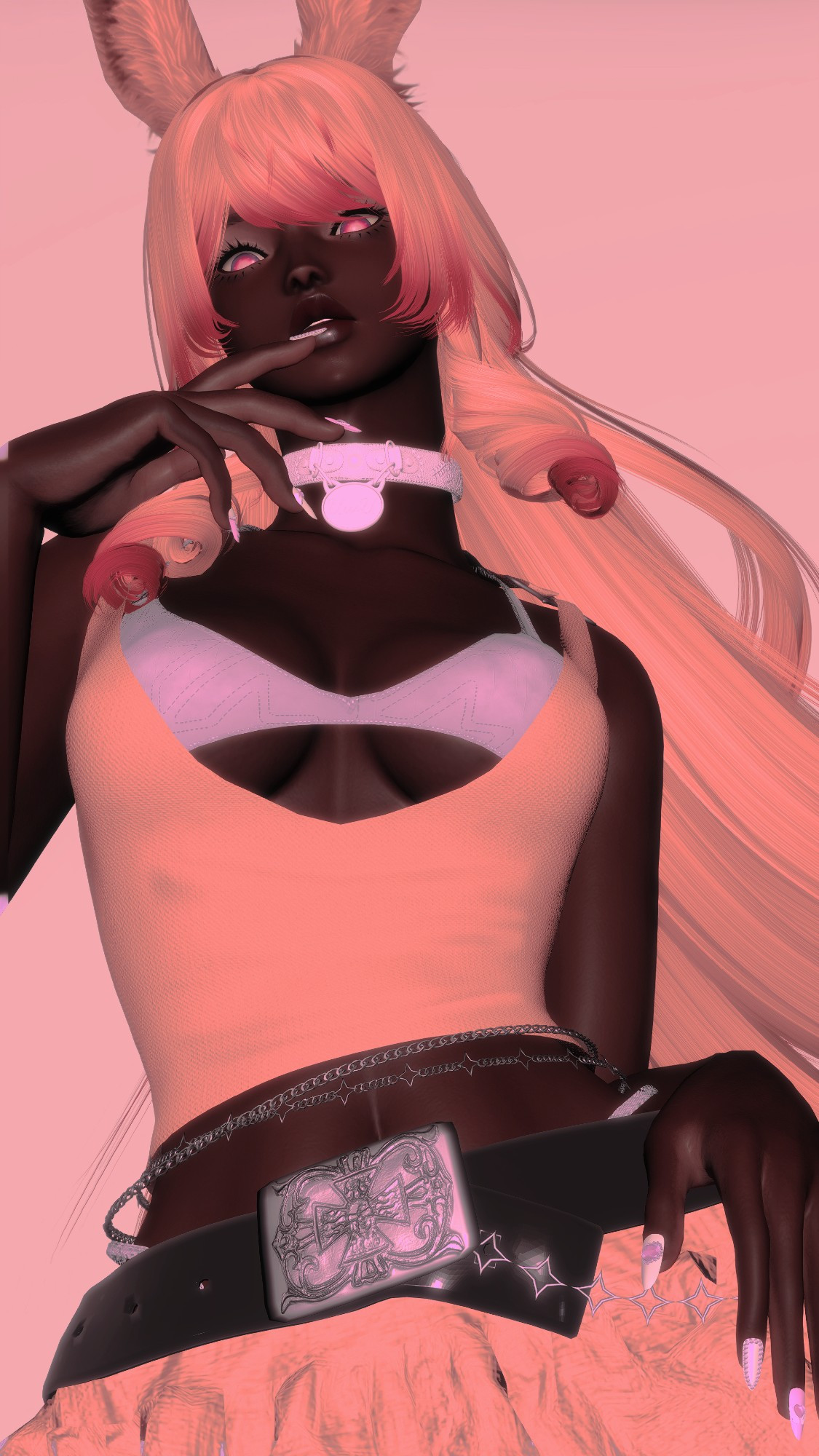 A Black Female Viera with pink hair, looking down at the camera. Her left hand is up to her face, her pointer finger resting on her lip while her right hand rests on her hip. She's wearing a pink tanktop, a magenta bralette and a black belt holding up a white skirt. She also is wearing a silver waist chain and a magenta choker. 