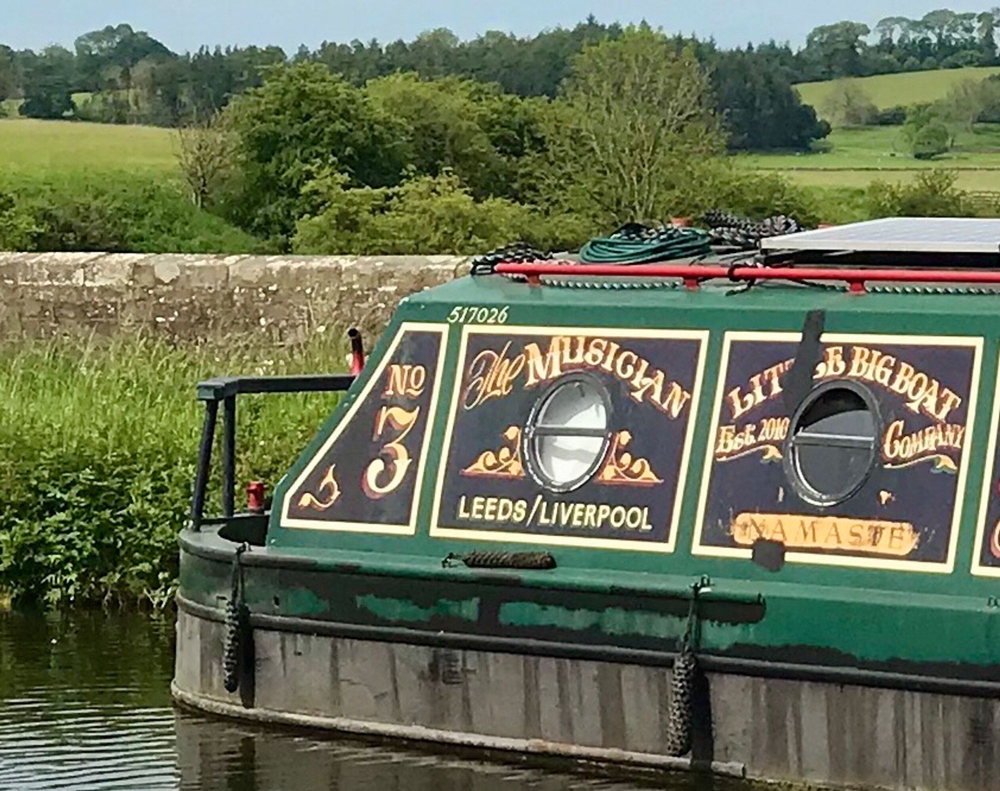 Boat called the Musician moored up on the Leeds Liverpool canal