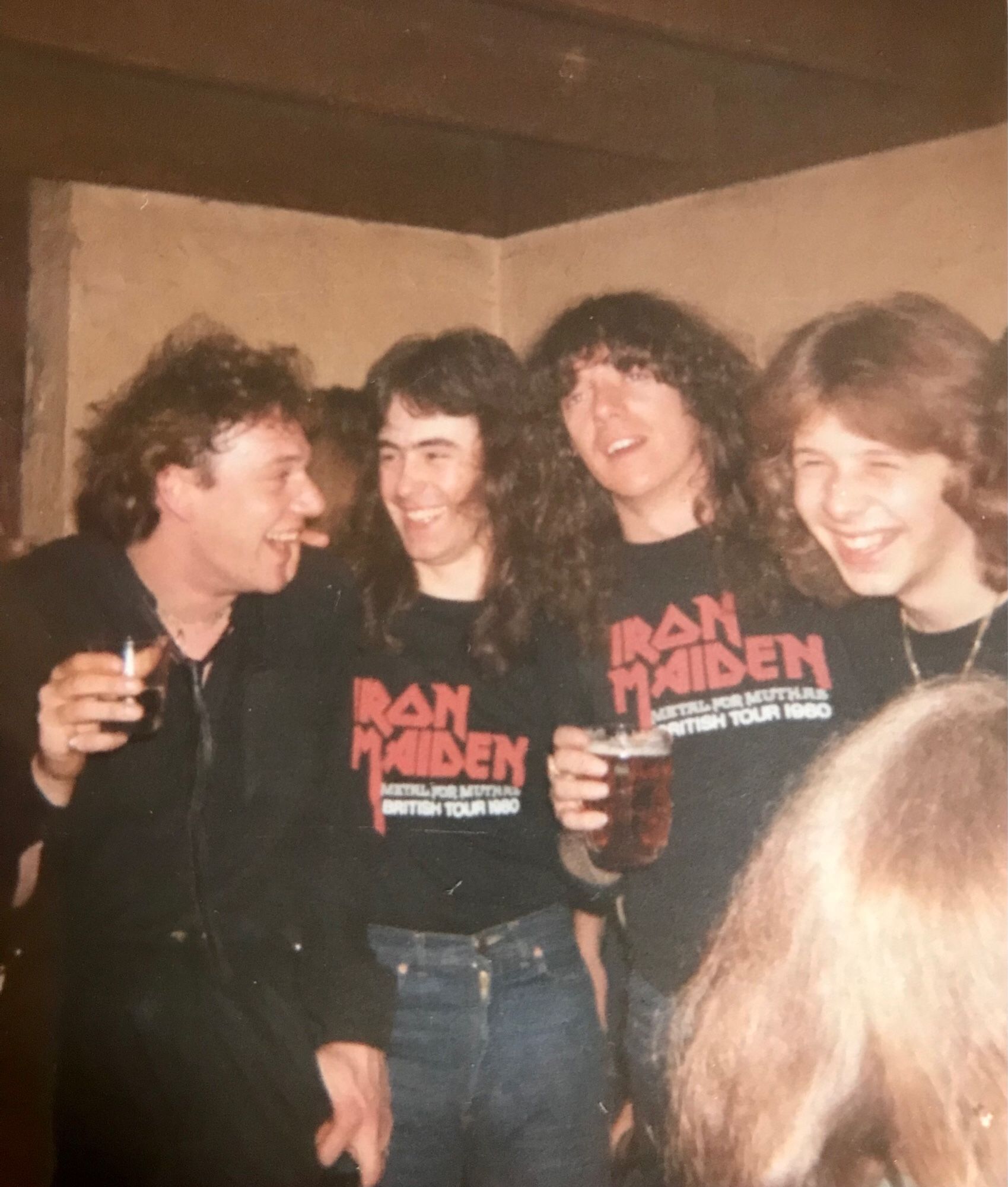 The band Iron Maiden having some drinks in a pub in London 1980