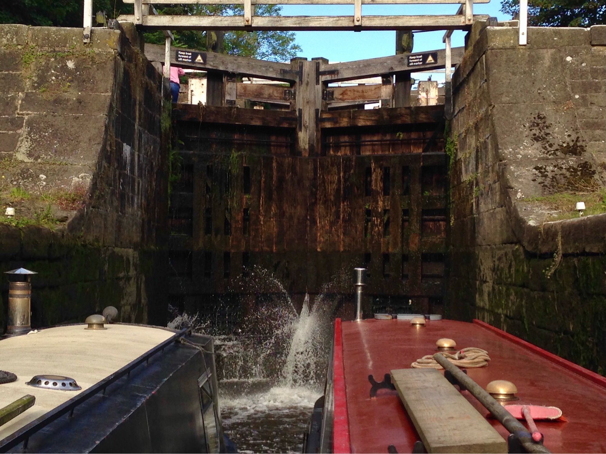 Narrowboats entering the first of 3 locks