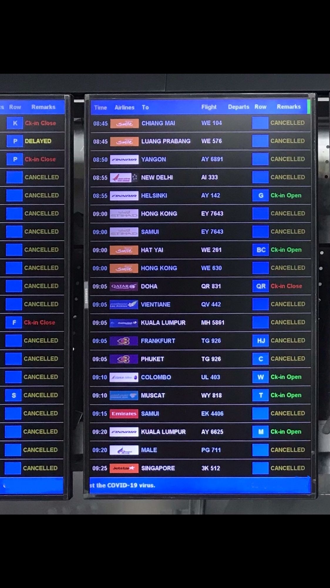 Airport departure board at the start of covid